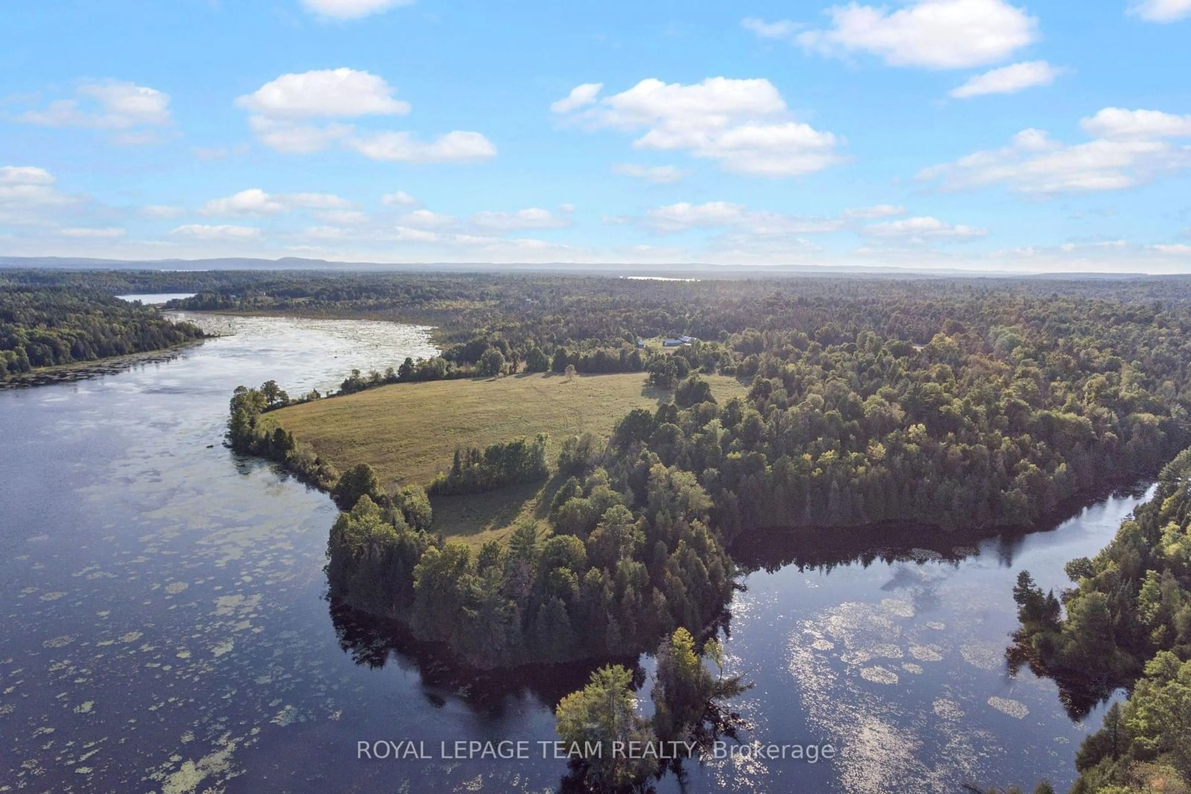 A pic from outside/outdoor area/front of a property/back of a property/a pic from drone, water/lake/river/ocean view for 105 Halliday Creek Rd, Greater Madawaska Ontario K0J 1G0