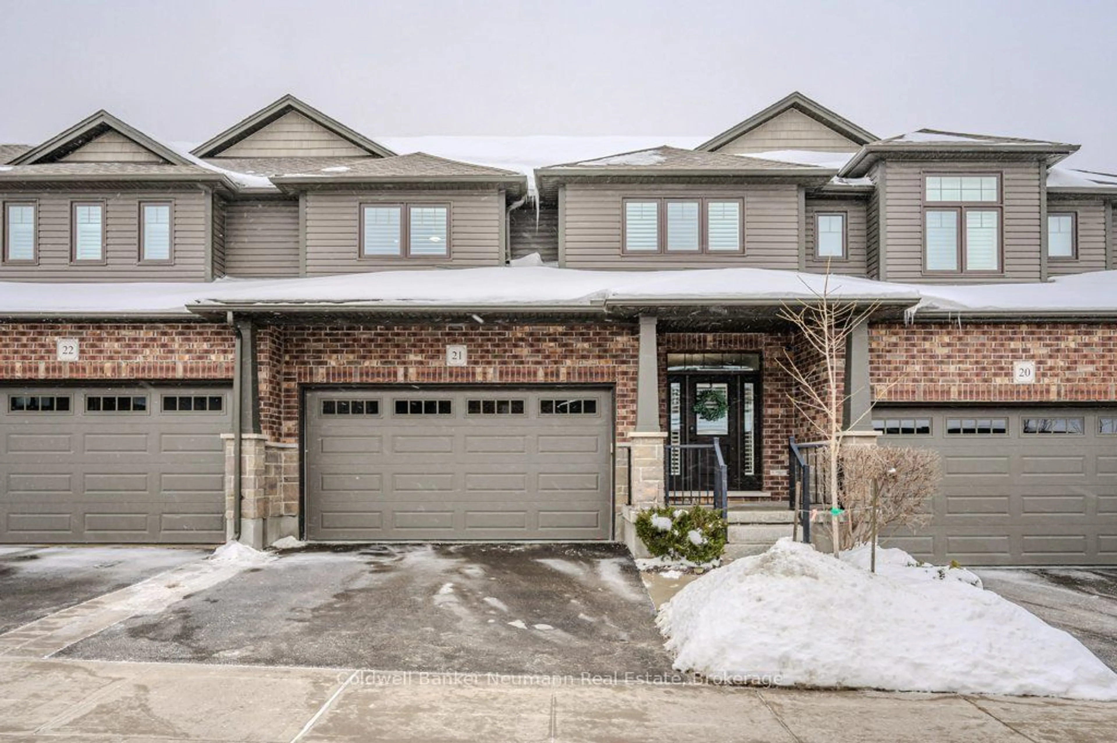 Home with brick exterior material, street for 254 Gosling Gdns #21, Guelph Ontario N1L 0M4