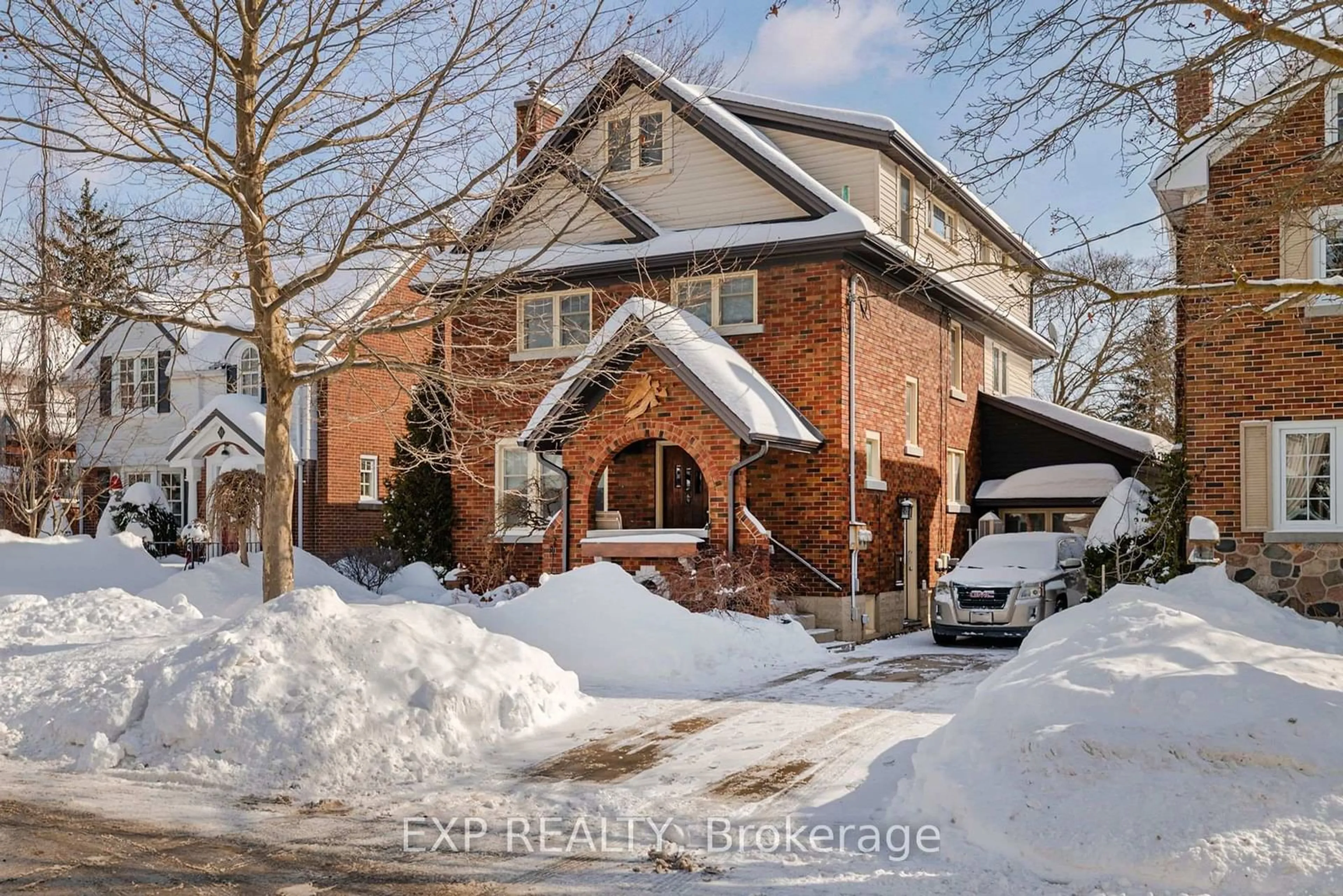 Home with brick exterior material, street for 77 Borden Ave, Kitchener Ontario N2H 3J2