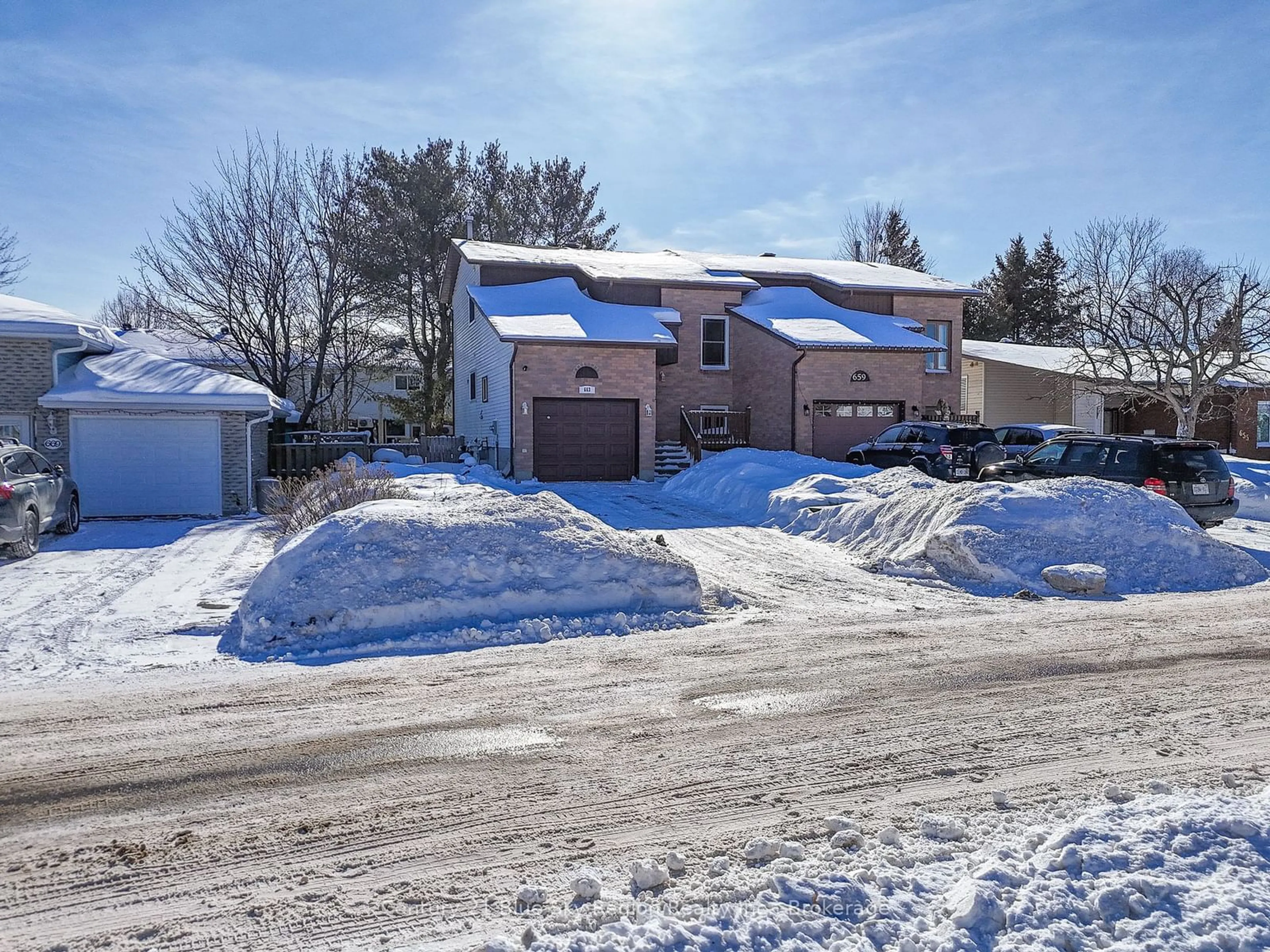 A pic from outside/outdoor area/front of a property/back of a property/a pic from drone, street for 663 Bromley Ave, North Bay Ontario P1B 9H9