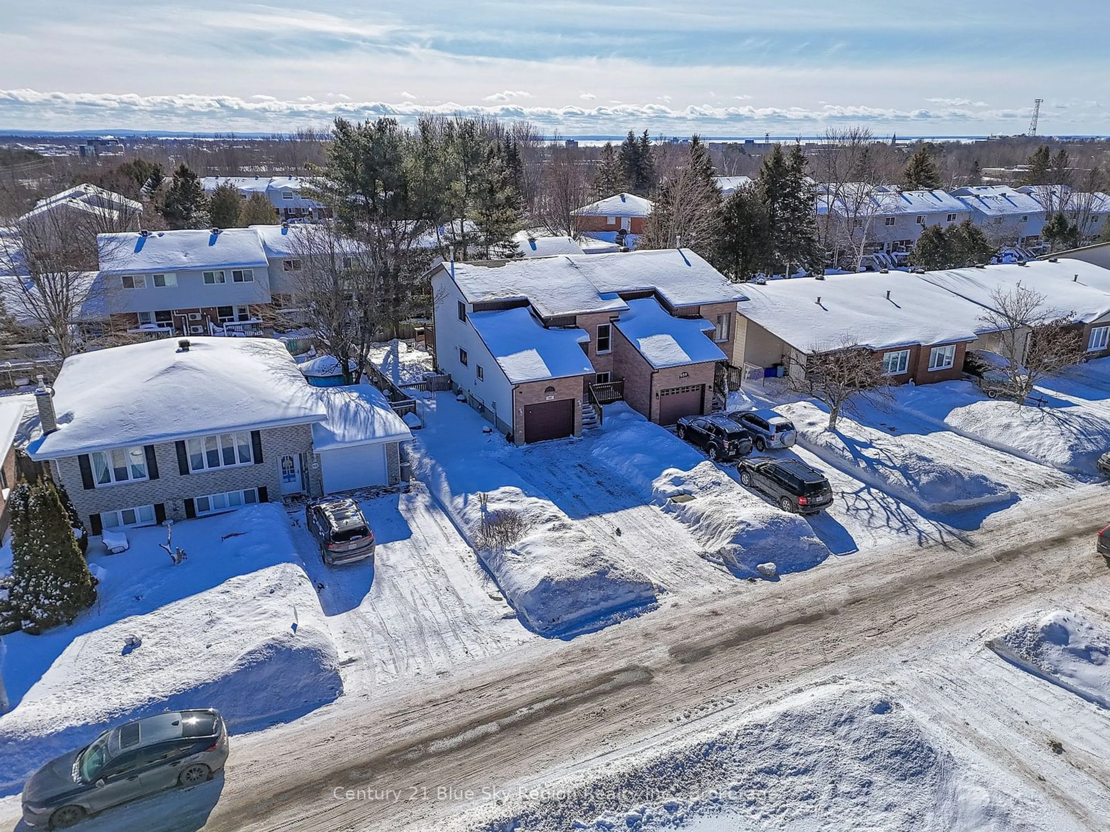 A pic from outside/outdoor area/front of a property/back of a property/a pic from drone, street for 663 Bromley Ave, North Bay Ontario P1B 9H9