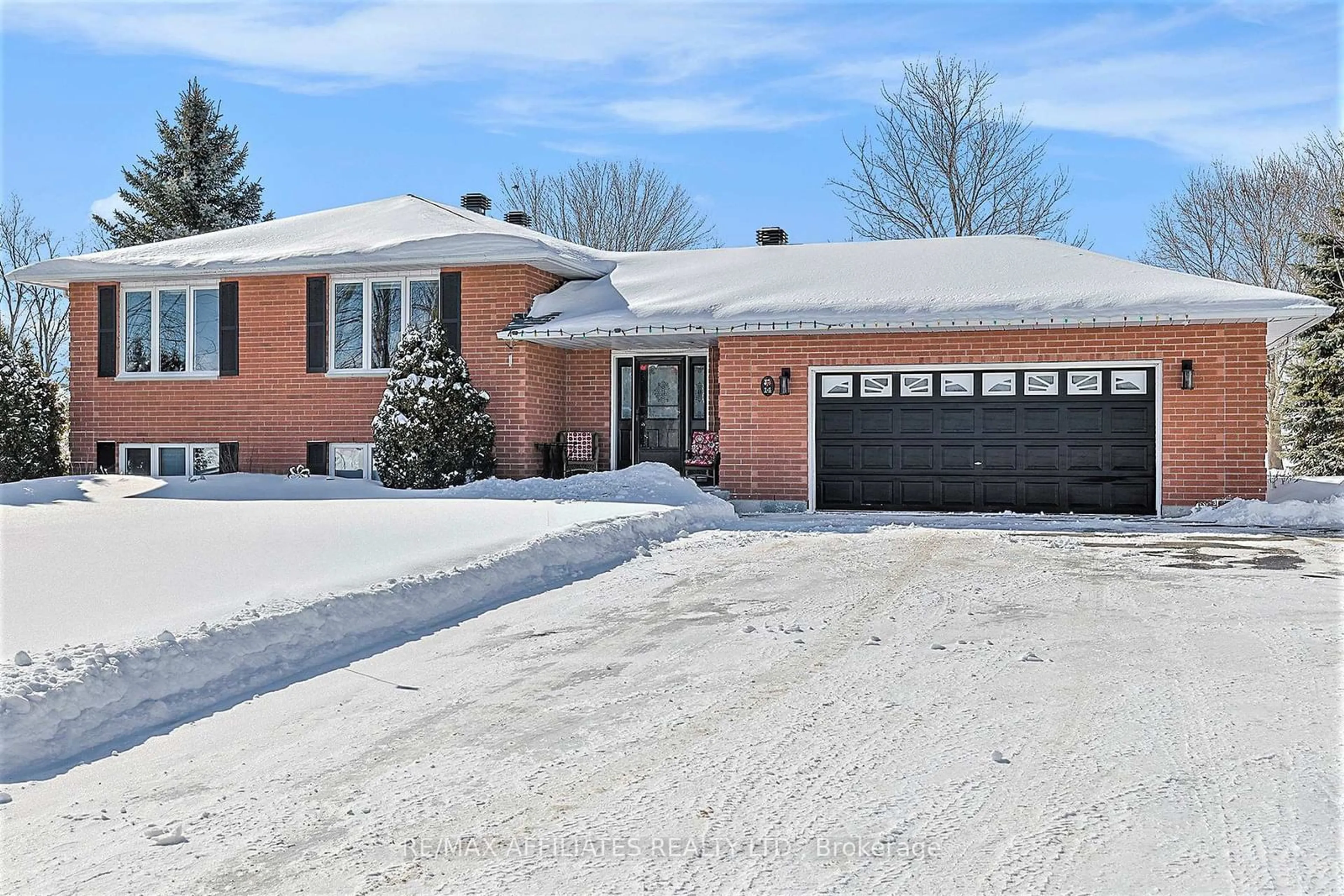 Home with brick exterior material, street for 14 Davis Lane, Rideau Lakes Ontario K7A 4S5