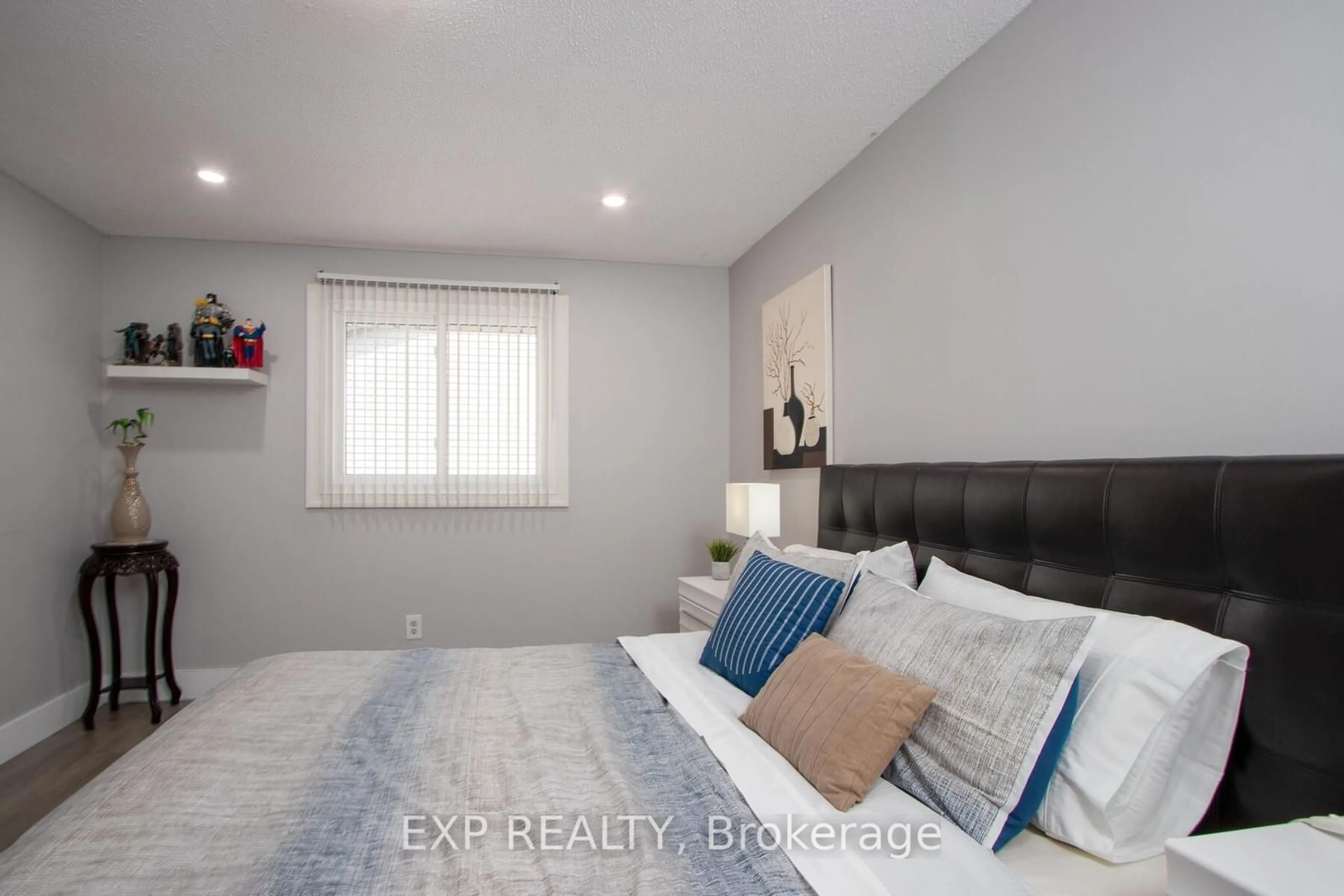 Bedroom with bed, wood/laminate floor for 75 Ansondale Rd #62, London Ontario N6C 5W5