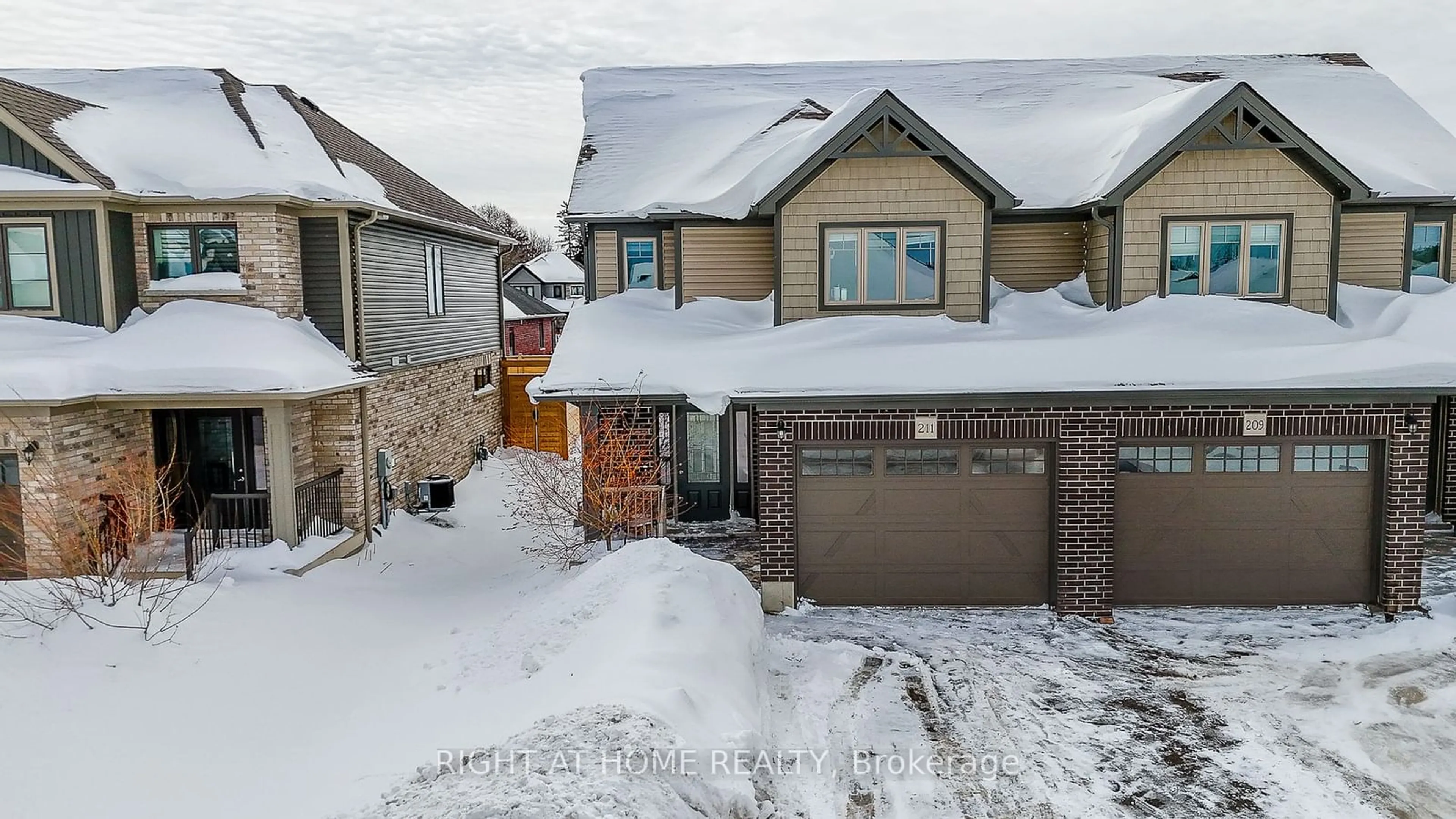 A pic from outside/outdoor area/front of a property/back of a property/a pic from drone, street for 211 Jackson St, West Grey Ontario N0G 1R0