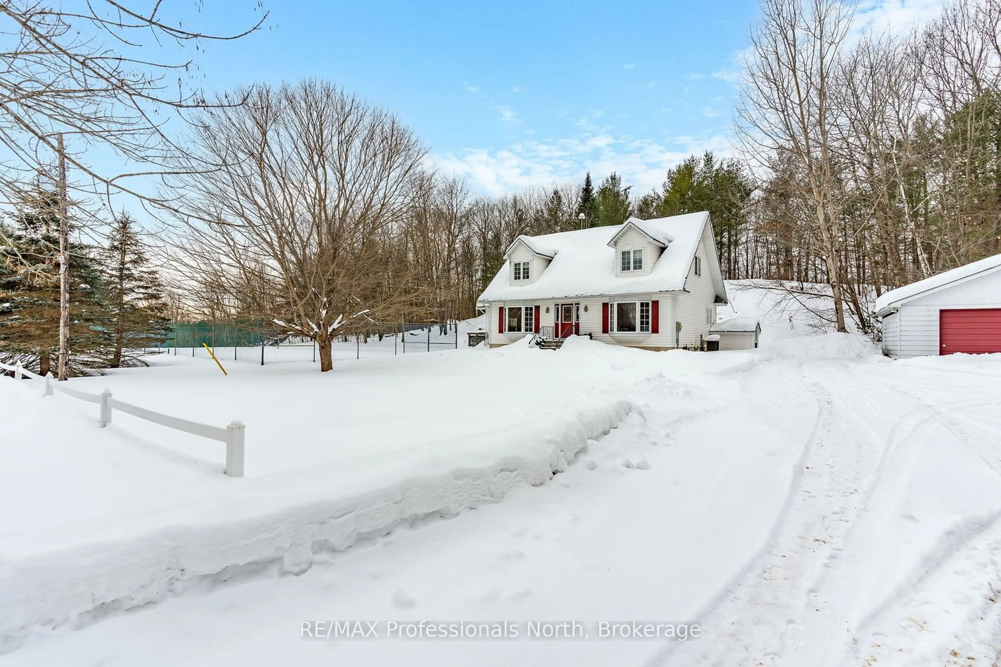 A pic from outside/outdoor area/front of a property/back of a property/a pic from drone, street for 1119 Deep Bay Rd, Minden Hills Ontario K0M 2K0