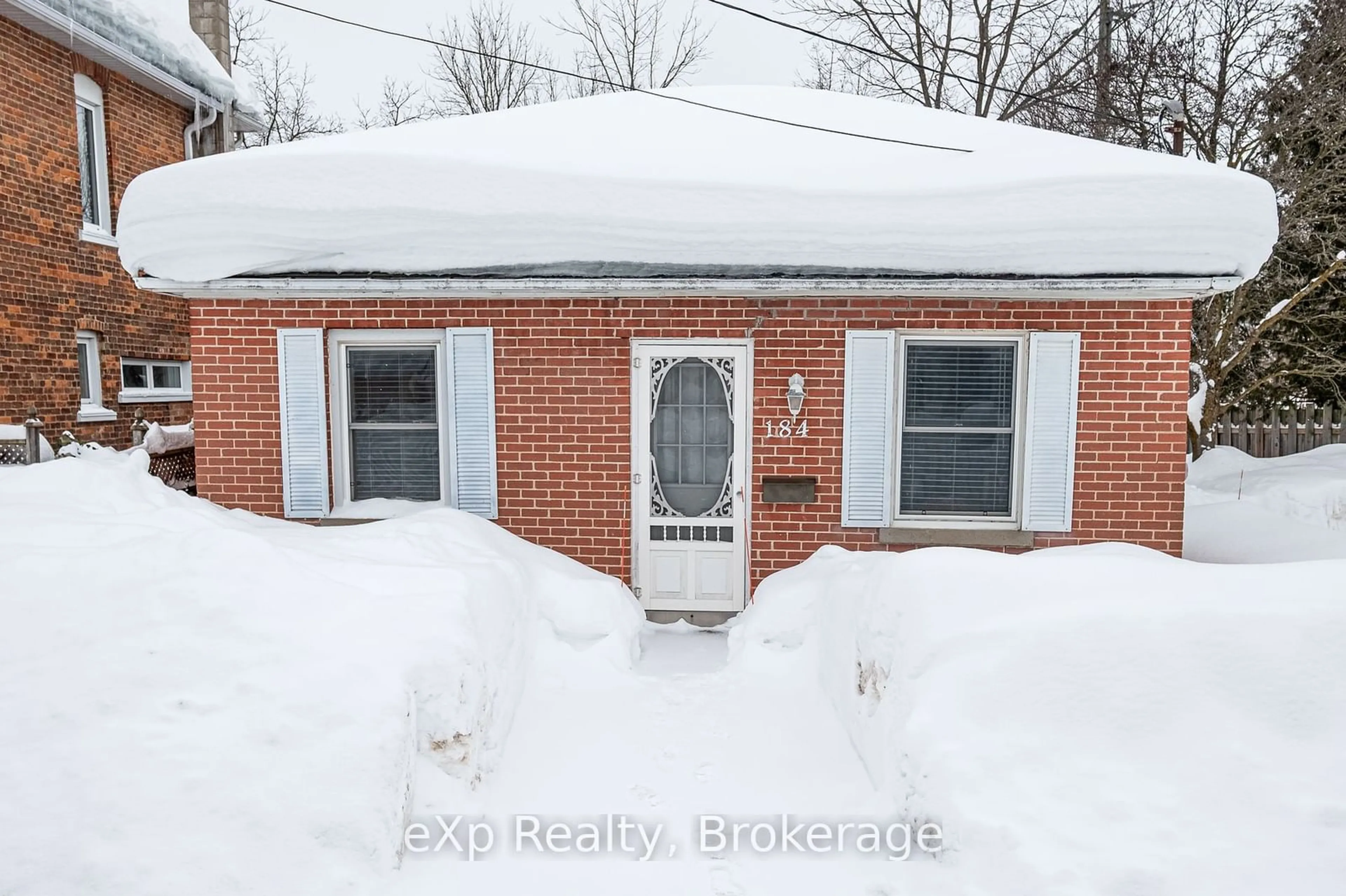 Home with brick exterior material, street for 184 5th Street A, Owen Sound Ontario N4K 1E6