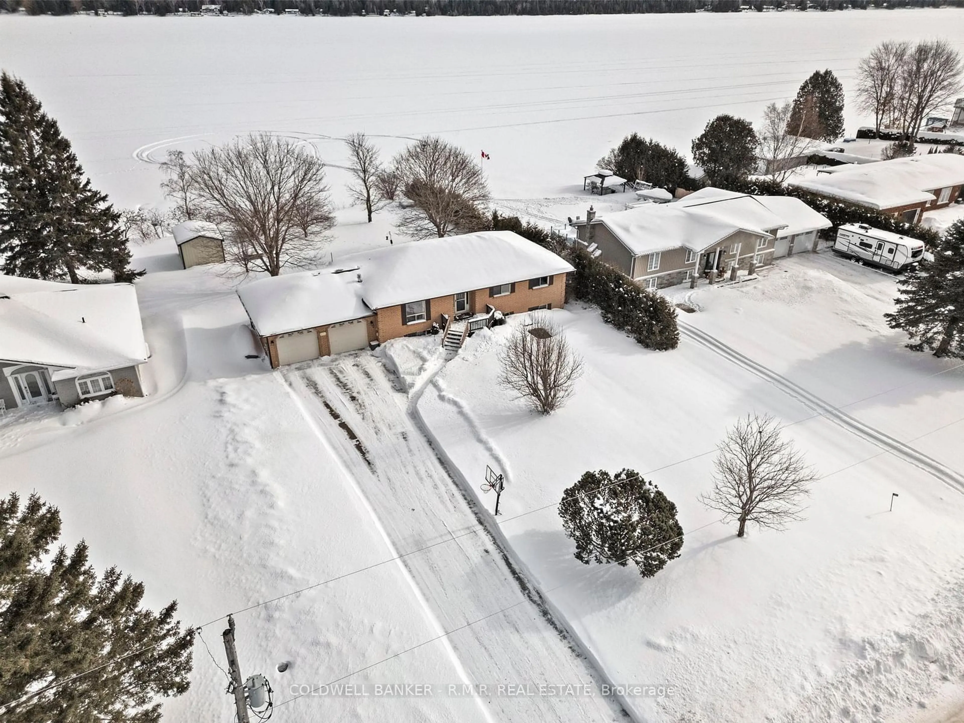 A pic from outside/outdoor area/front of a property/back of a property/a pic from drone, unknown for 84 Pinewood Blvd, Kawartha Lakes Ontario K0M 2T0