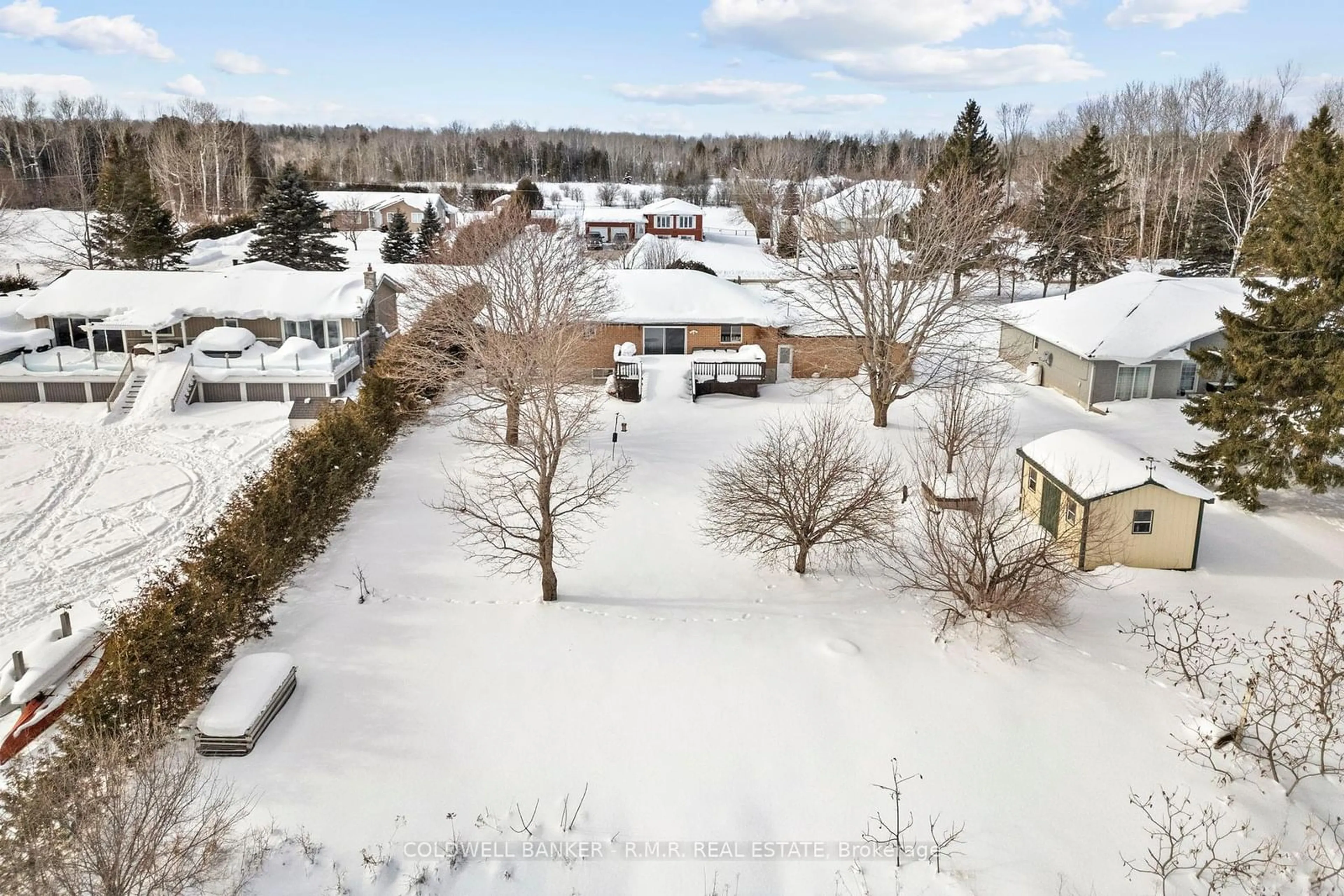 A pic from outside/outdoor area/front of a property/back of a property/a pic from drone, street for 84 Pinewood Blvd, Kawartha Lakes Ontario K0M 2T0