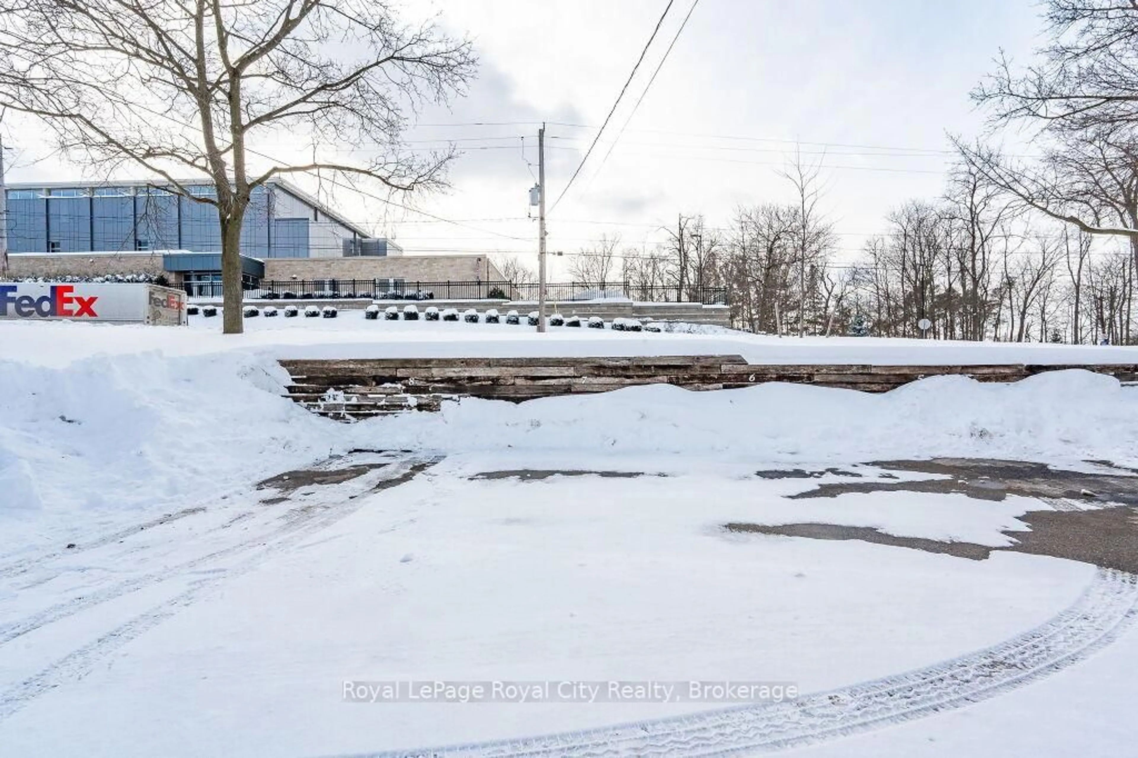 A pic from outside/outdoor area/front of a property/back of a property/a pic from drone, street for 1 Sunnylea Cres #107, Guelph Ontario N1E 1W1