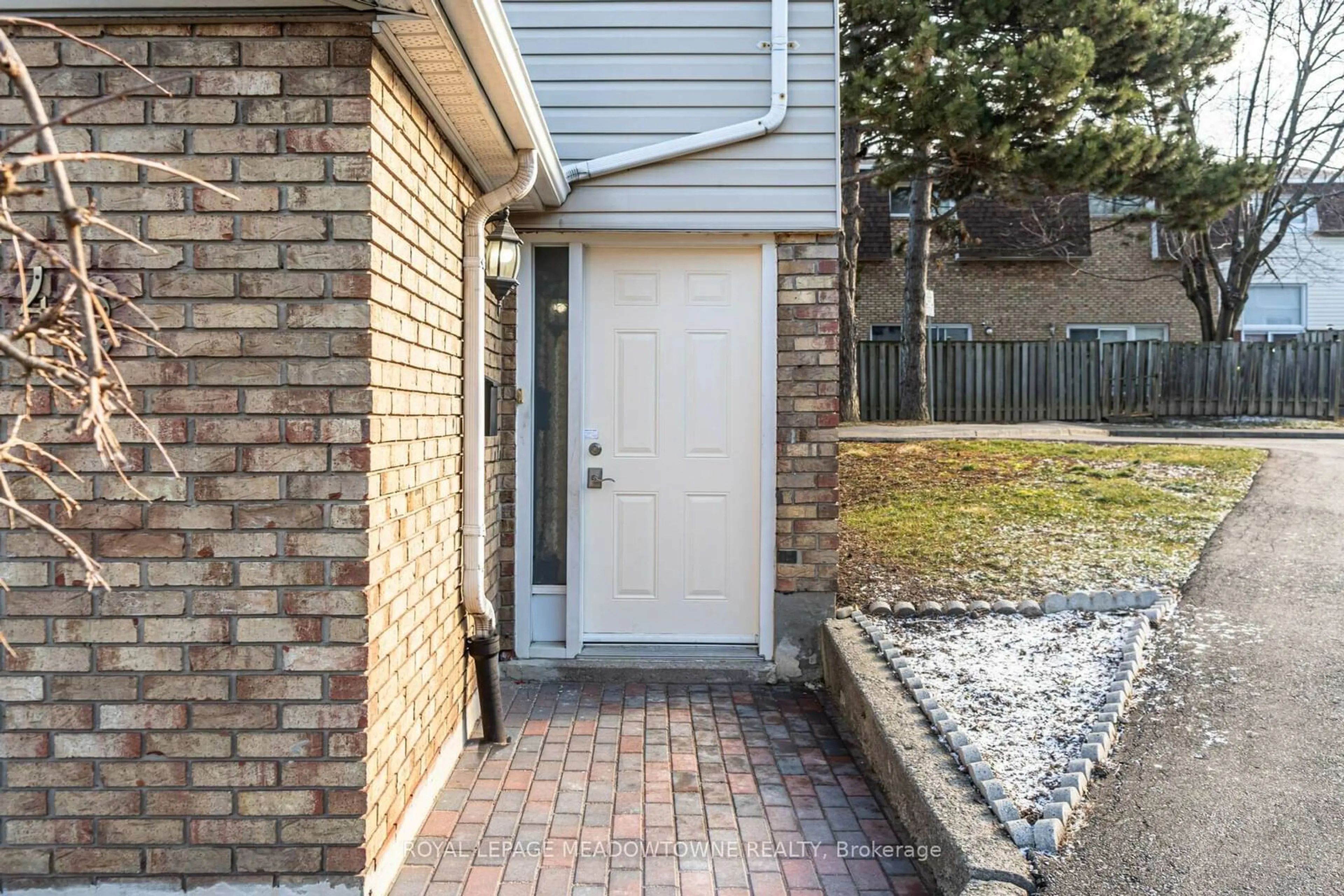 Home with brick exterior material, street for 11 Harrisford St #42, Hamilton Ontario L8K 6L7