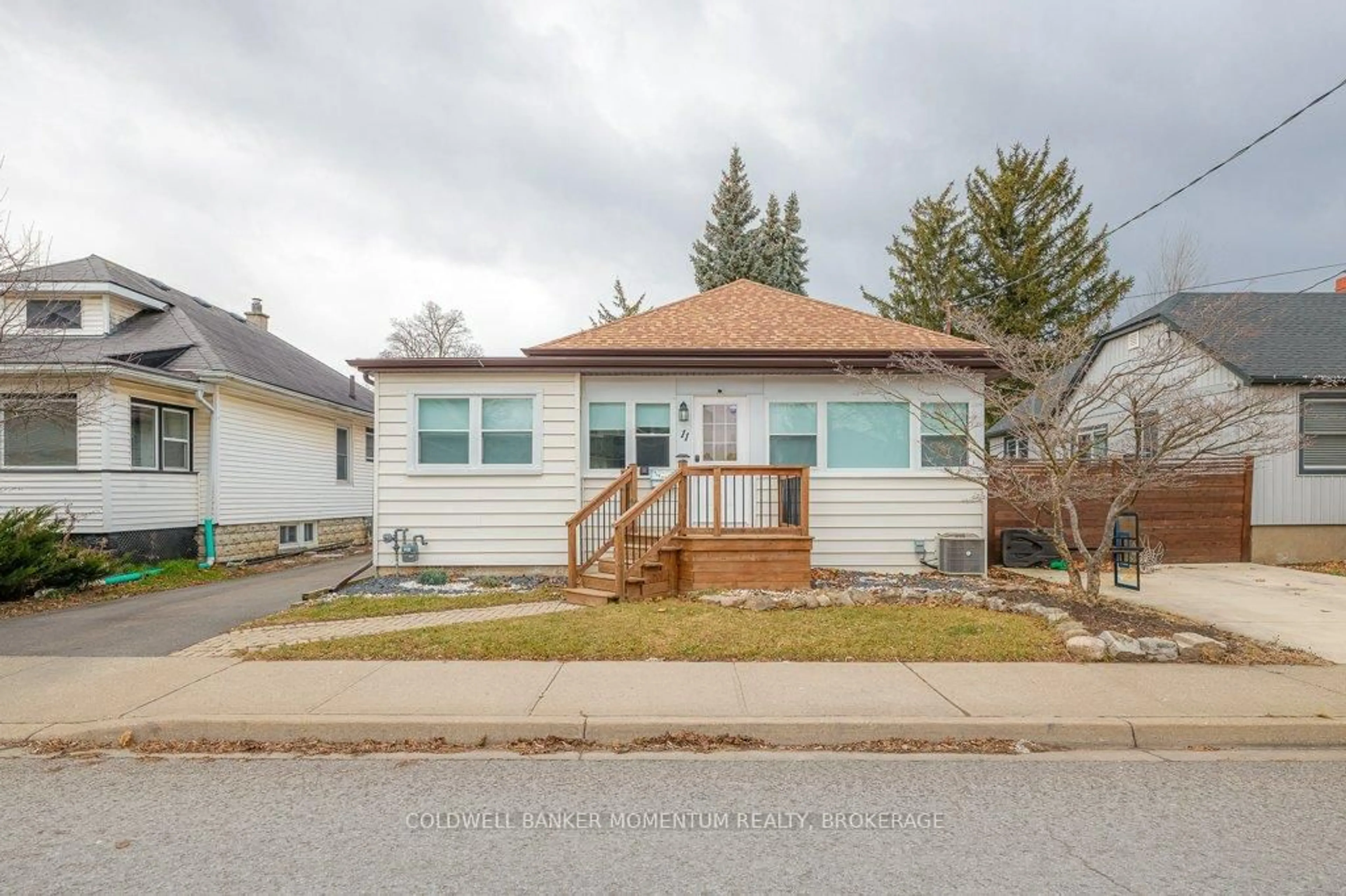 Home with vinyl exterior material, street for 11 Grantham Ave, St. Catharines Ontario L2P 3B3