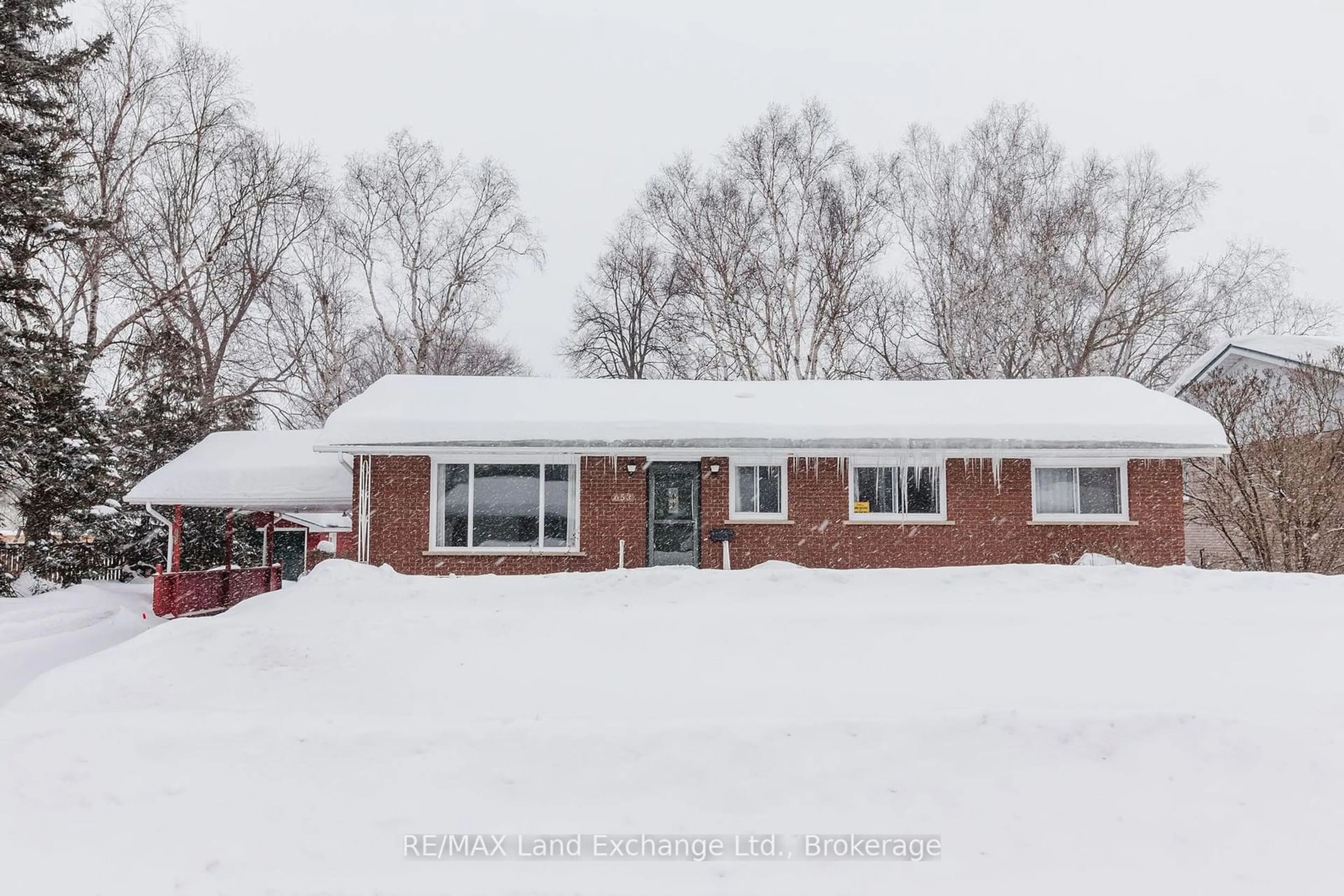 Home with brick exterior material, street for 653 Orchard Dr, Saugeen Shores Ontario N0H 2C3