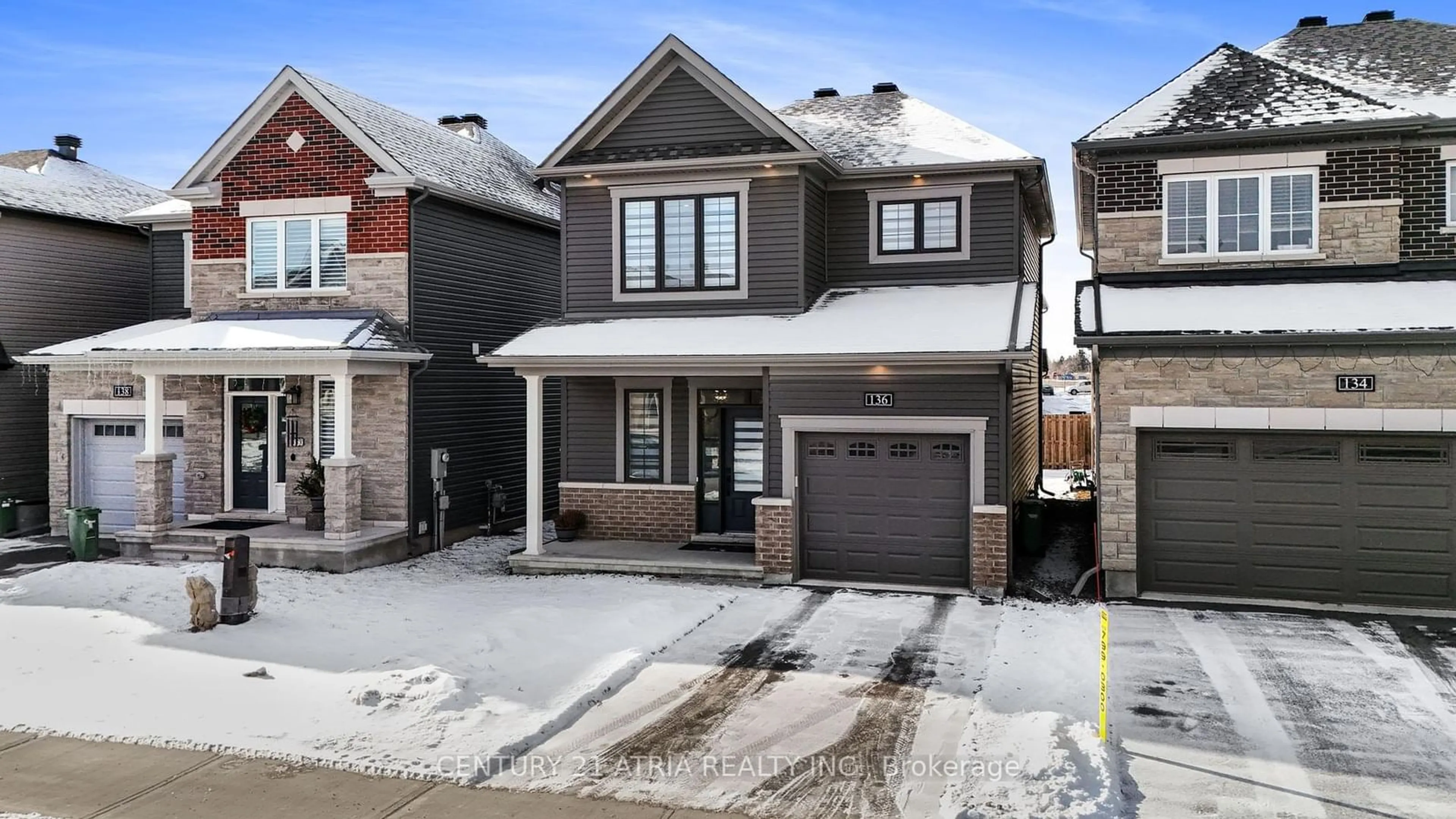 Home with brick exterior material, street for 136 Robin Easey Ave, Barrhaven Ontario K2J 6S1