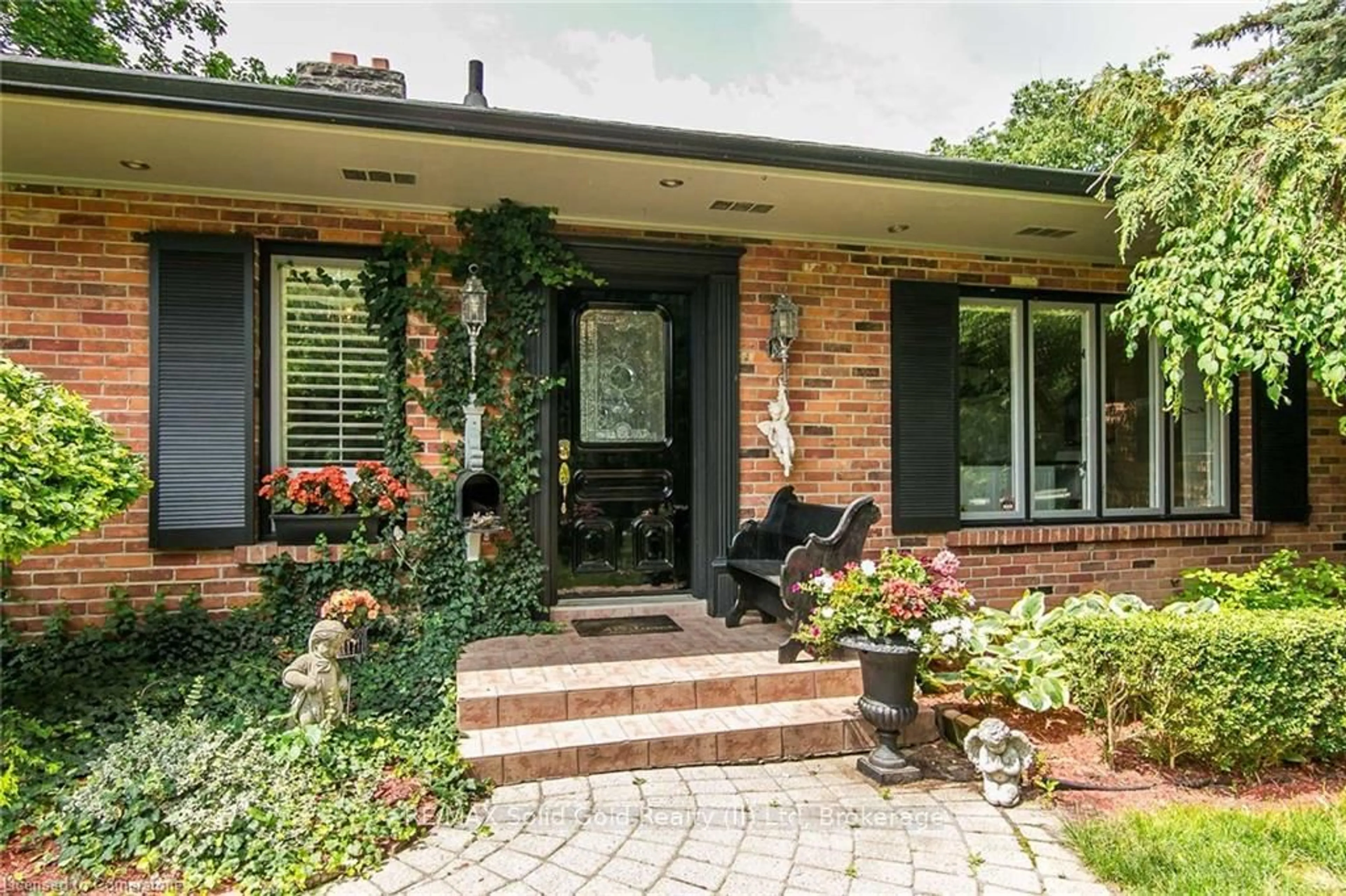 Home with brick exterior material, street for 65 Edgehill Dr, Kitchener Ontario N2P 2C7