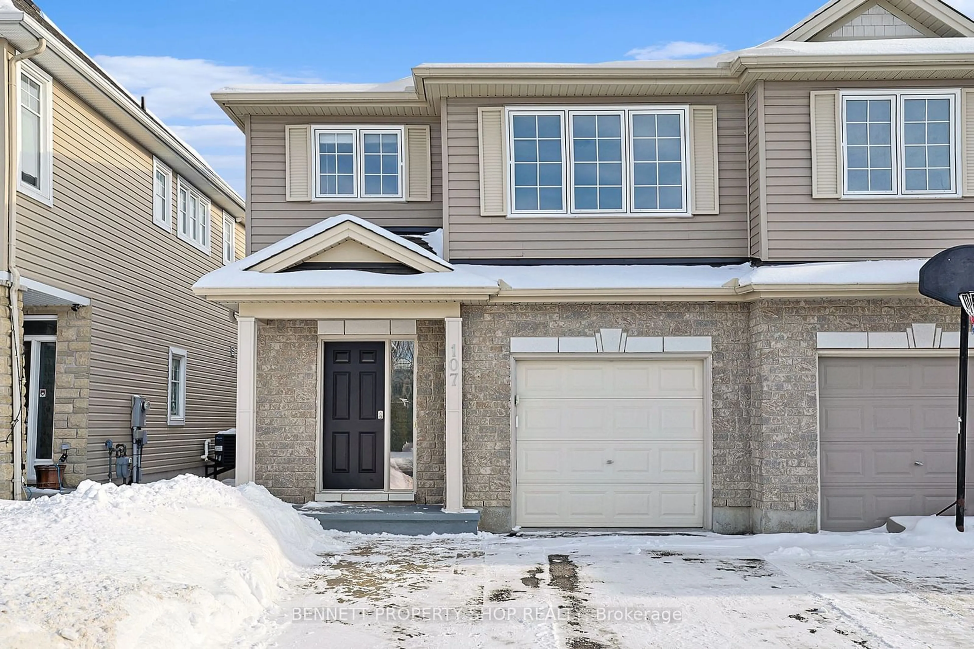 Home with brick exterior material, street for 107 Bandelier Way, Stittsville - Munster - Richmond Ontario K2S 0C3