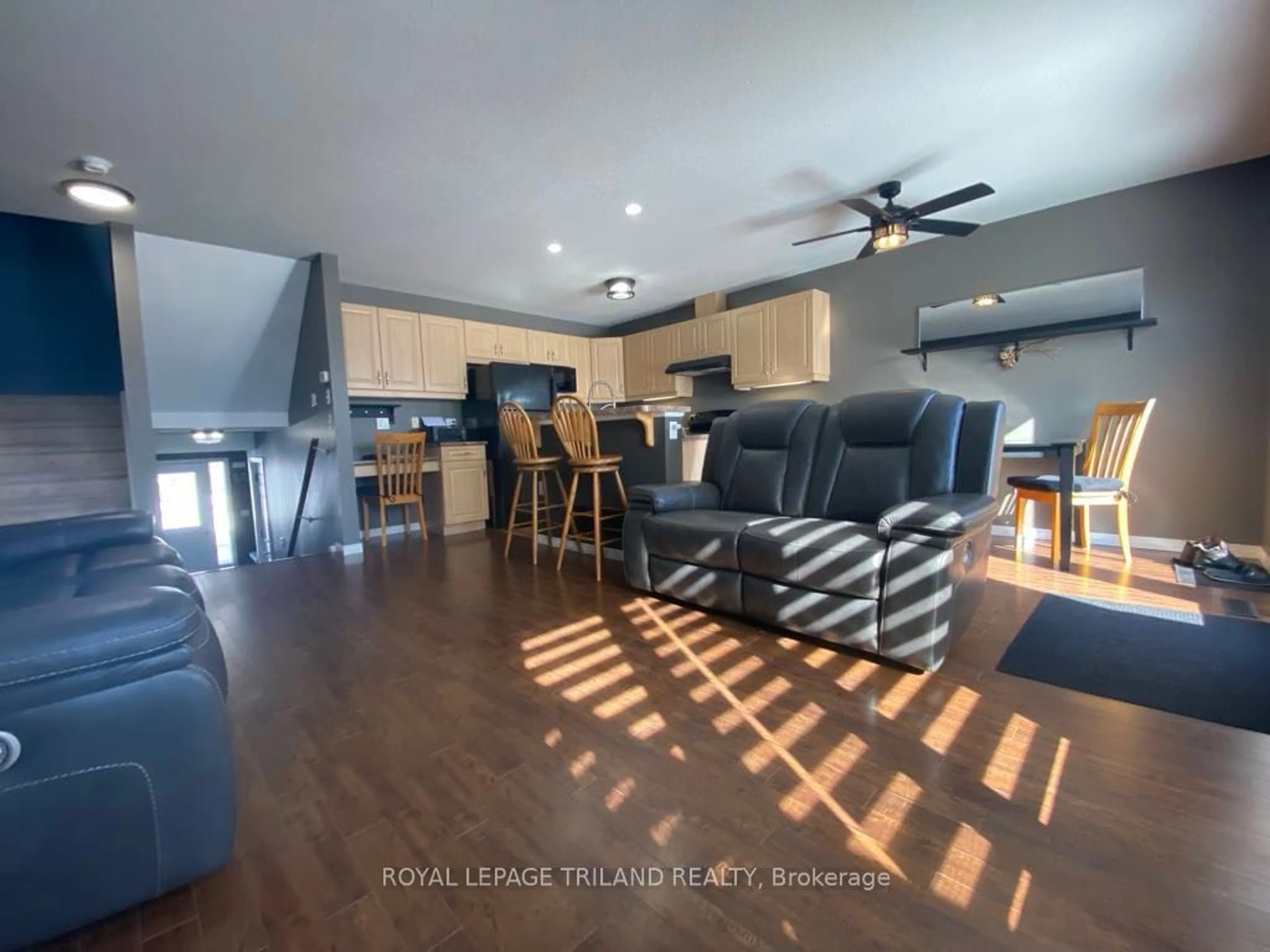 Living room with furniture, wood/laminate floor for 2145 North Routledge Park #37, London Ontario N6G 0J8