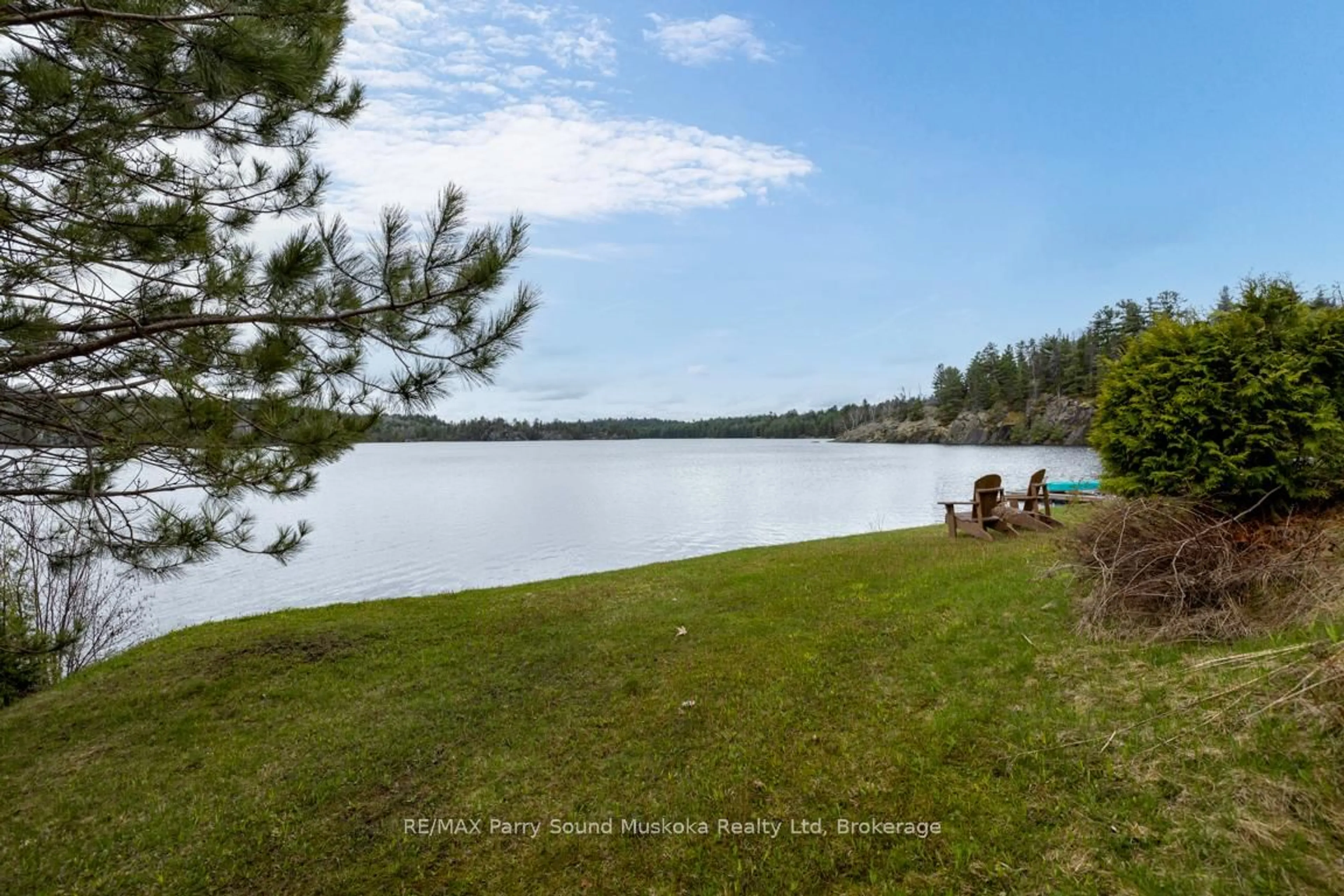 A pic from outside/outdoor area/front of a property/back of a property/a pic from drone, water/lake/river/ocean view for 247 Blue Jay Rd, French River Ontario P0M 2N0