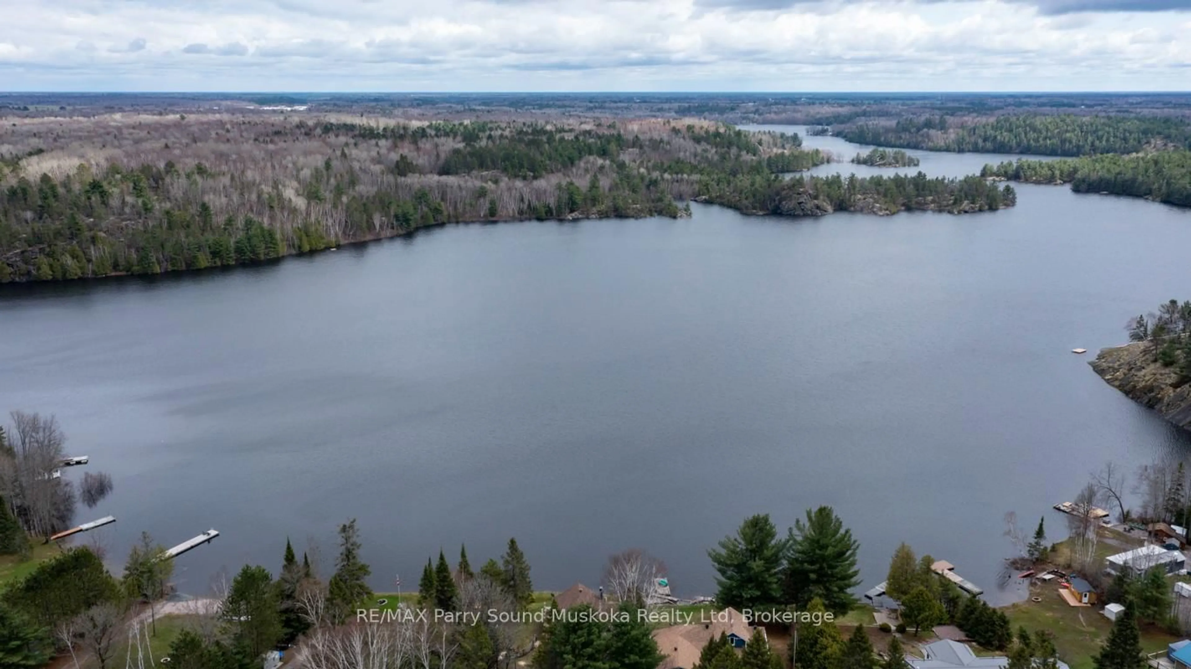 A pic from outside/outdoor area/front of a property/back of a property/a pic from drone, water/lake/river/ocean view for 247 Blue Jay Rd, French River Ontario P0M 2N0