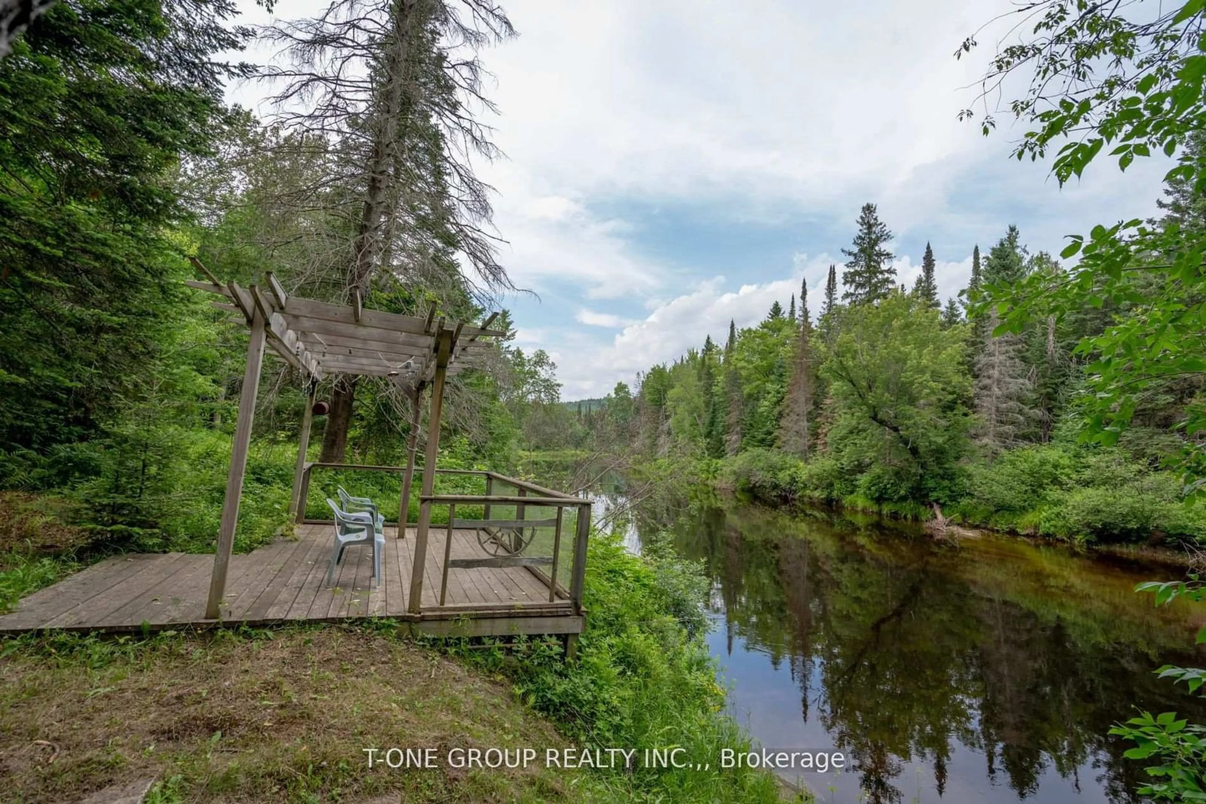 A pic from outside/outdoor area/front of a property/back of a property/a pic from drone, water/lake/river/ocean view for 10 Riverside Crct, Hastings Highlands Ontario K0L 1C0