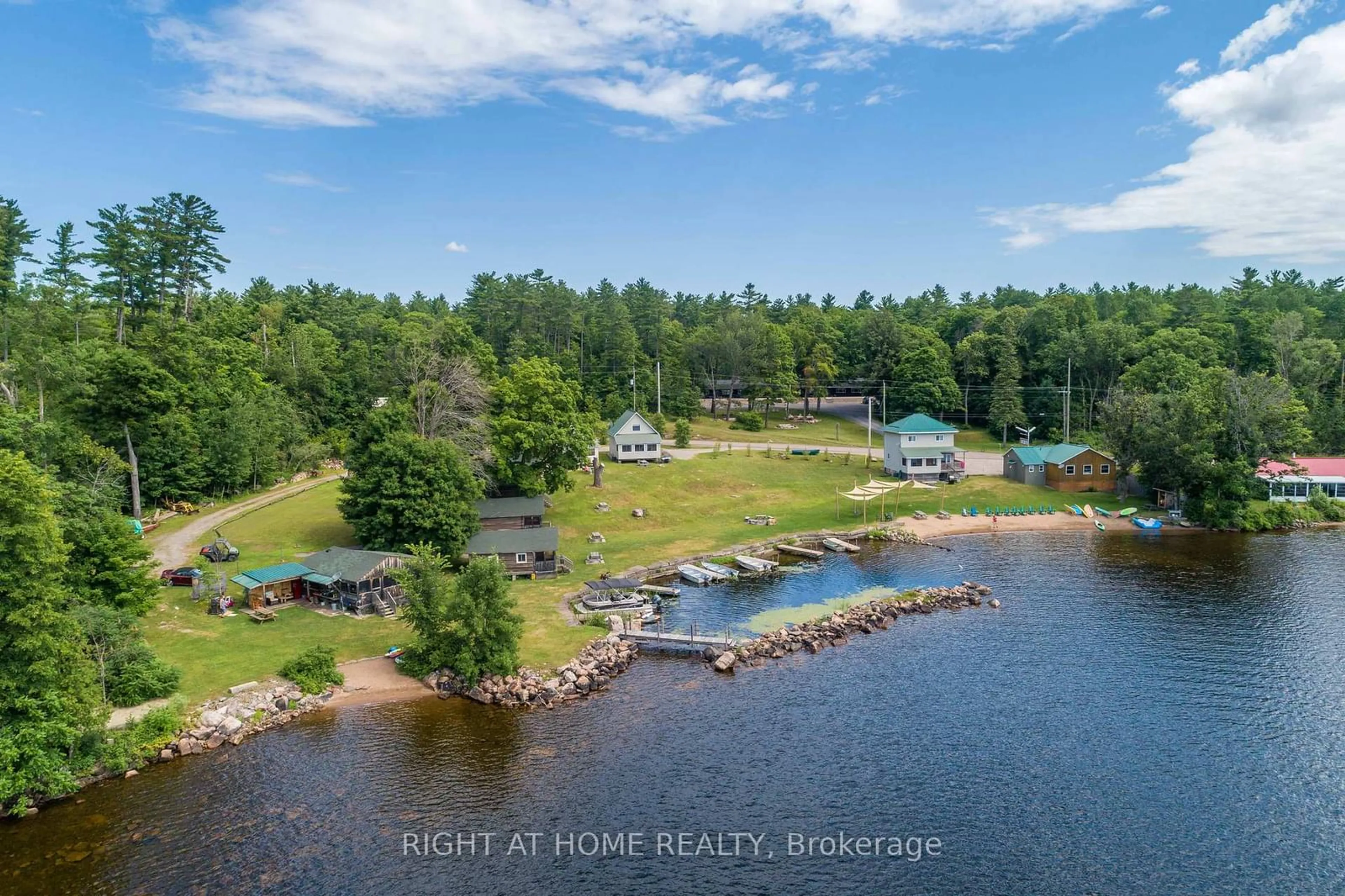 A pic from outside/outdoor area/front of a property/back of a property/a pic from drone, water/lake/river/ocean view for 5253 Calabogie Rd, Greater Madawaska Ontario K0J 1H0