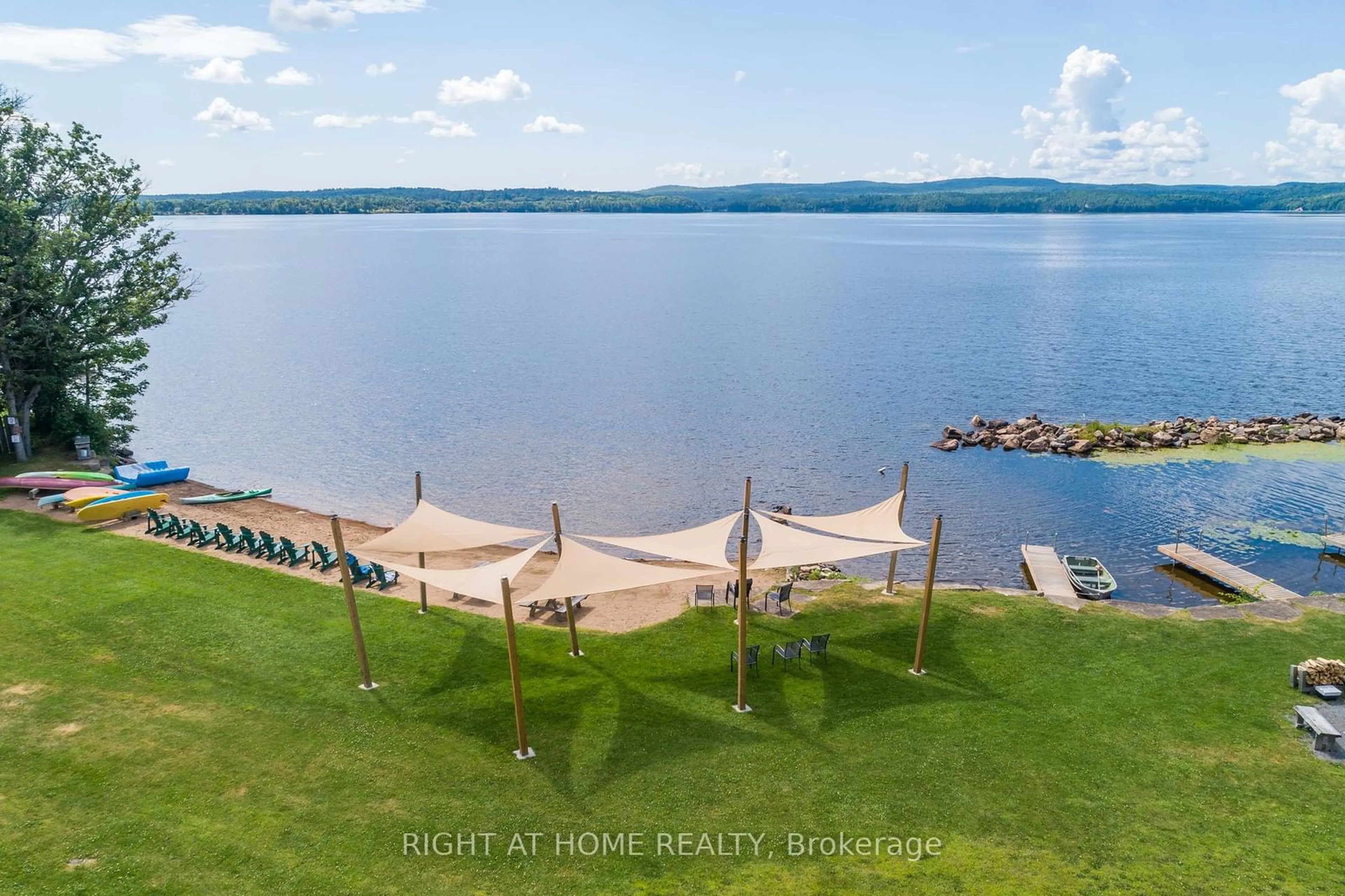 A pic from outside/outdoor area/front of a property/back of a property/a pic from drone, water/lake/river/ocean view for 5253 Calabogie Rd, Greater Madawaska Ontario K0J 1H0