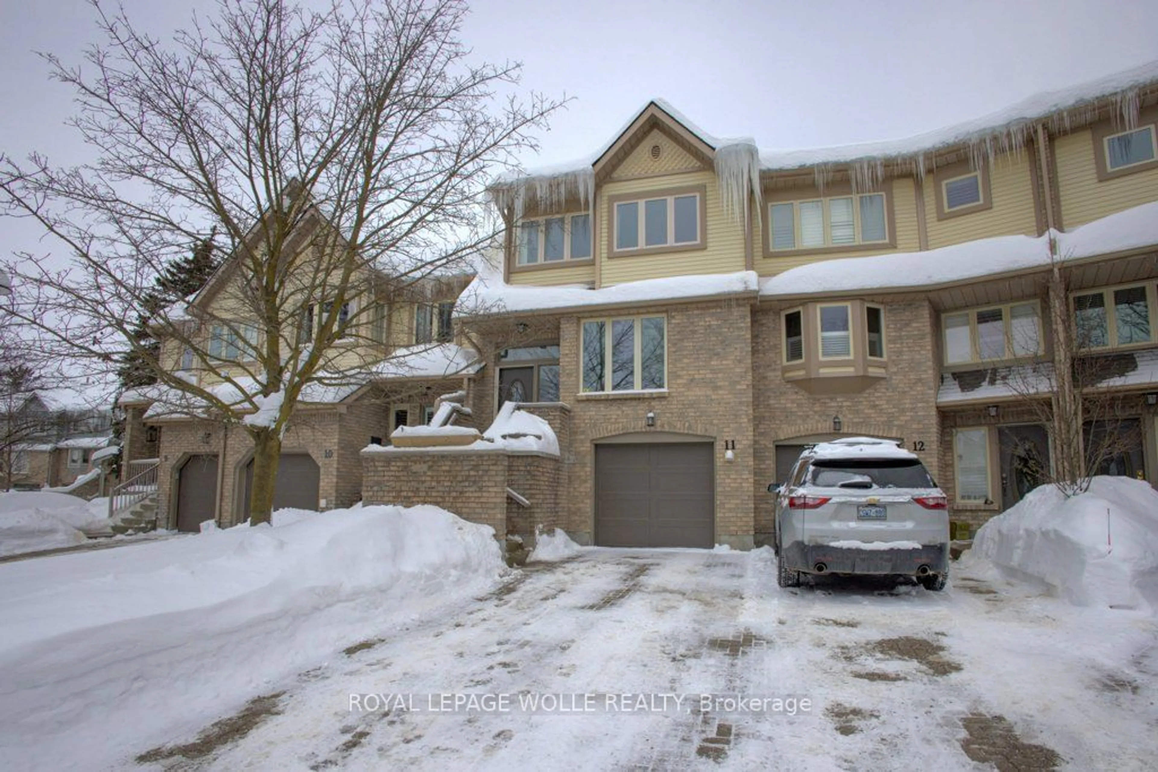 A pic from outside/outdoor area/front of a property/back of a property/a pic from drone, street for 225 Benjamin Rd #11, Waterloo Ontario N2V 1Z3