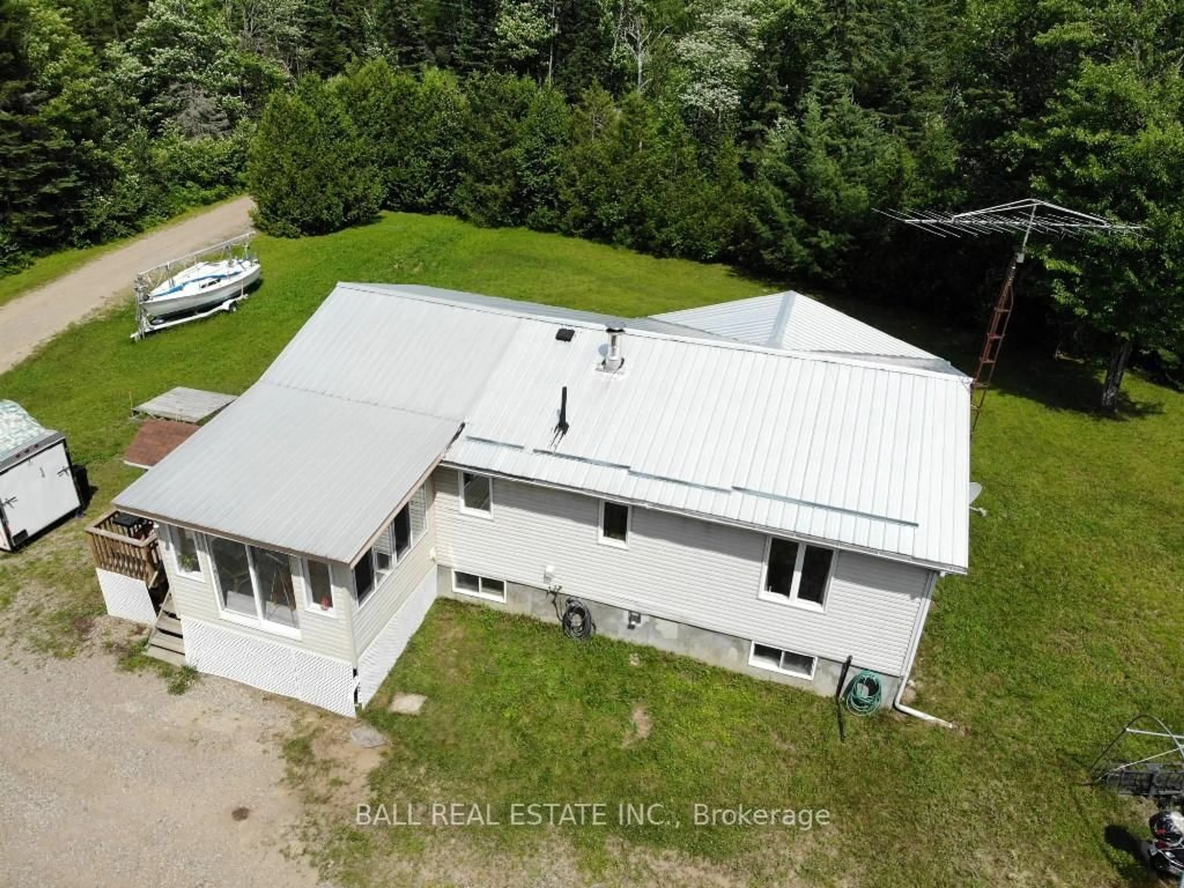 A pic from outside/outdoor area/front of a property/back of a property/a pic from drone, building for 7113 Highway 127, South Algonquin Ontario K0J 2M0