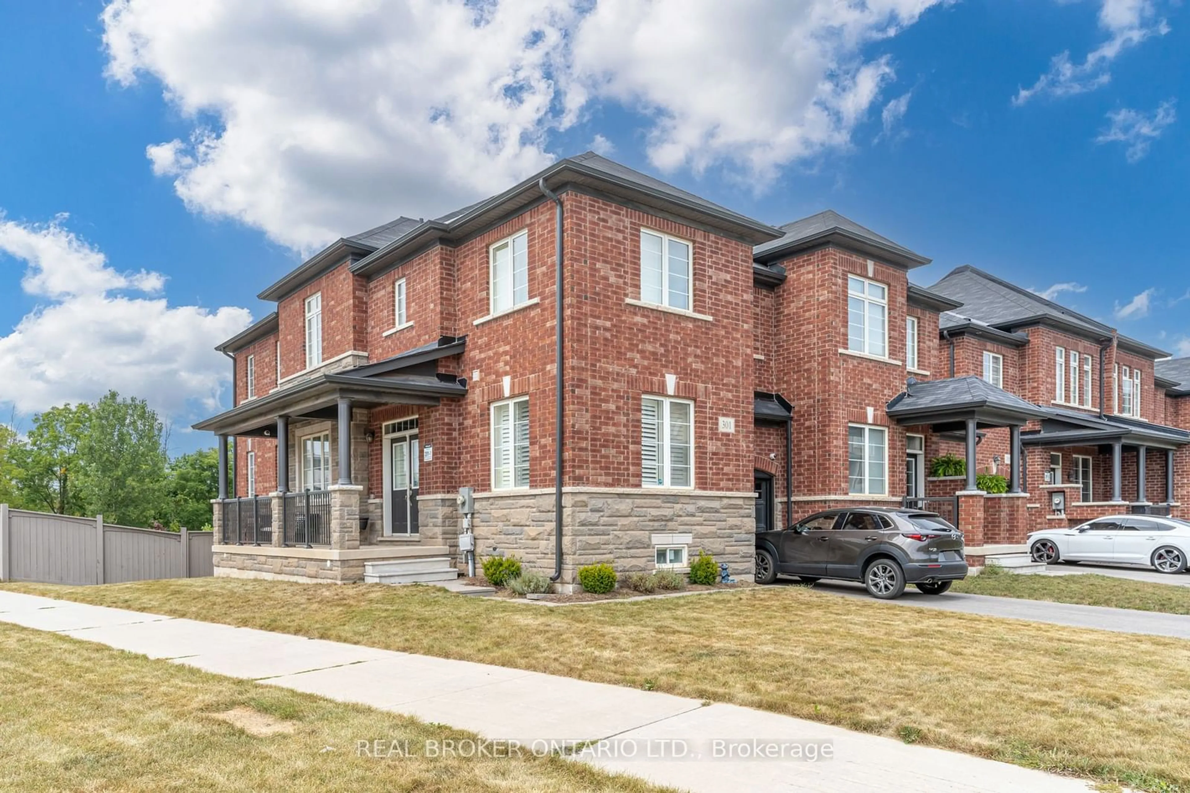 Home with brick exterior material, street for 301 Humphrey St, Hamilton Ontario L8B 1X4