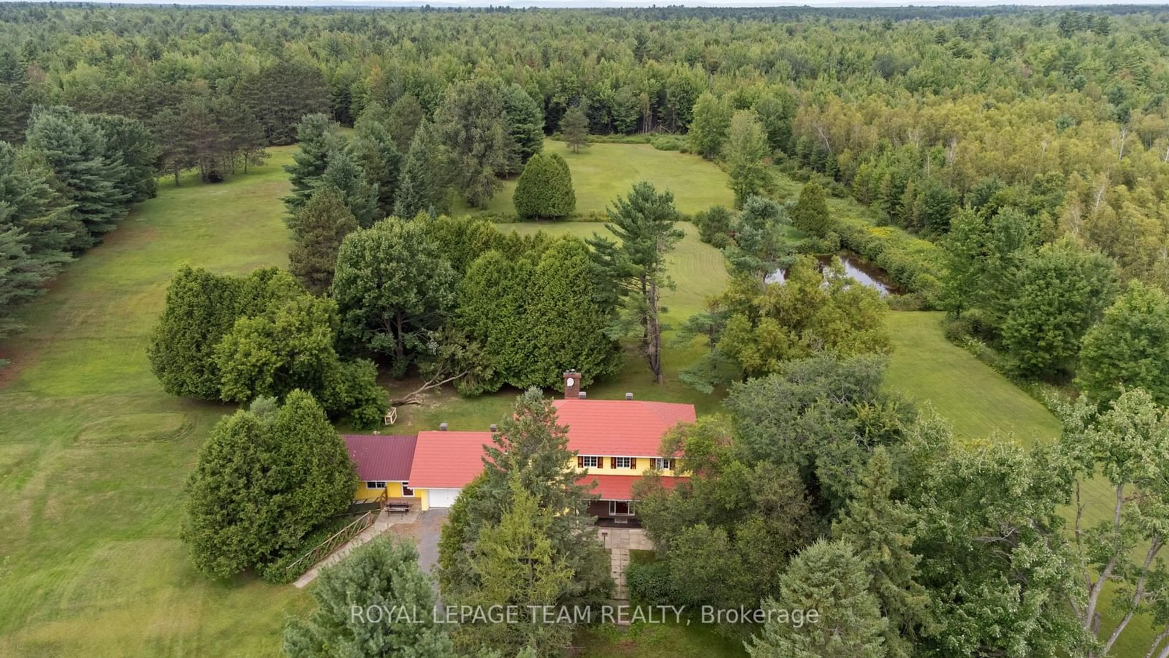 A pic from outside/outdoor area/front of a property/back of a property/a pic from drone, forest/trees view for 1831 COUNTY 2 Rd, Alfred and Plantagenet Ontario K0B 1C0