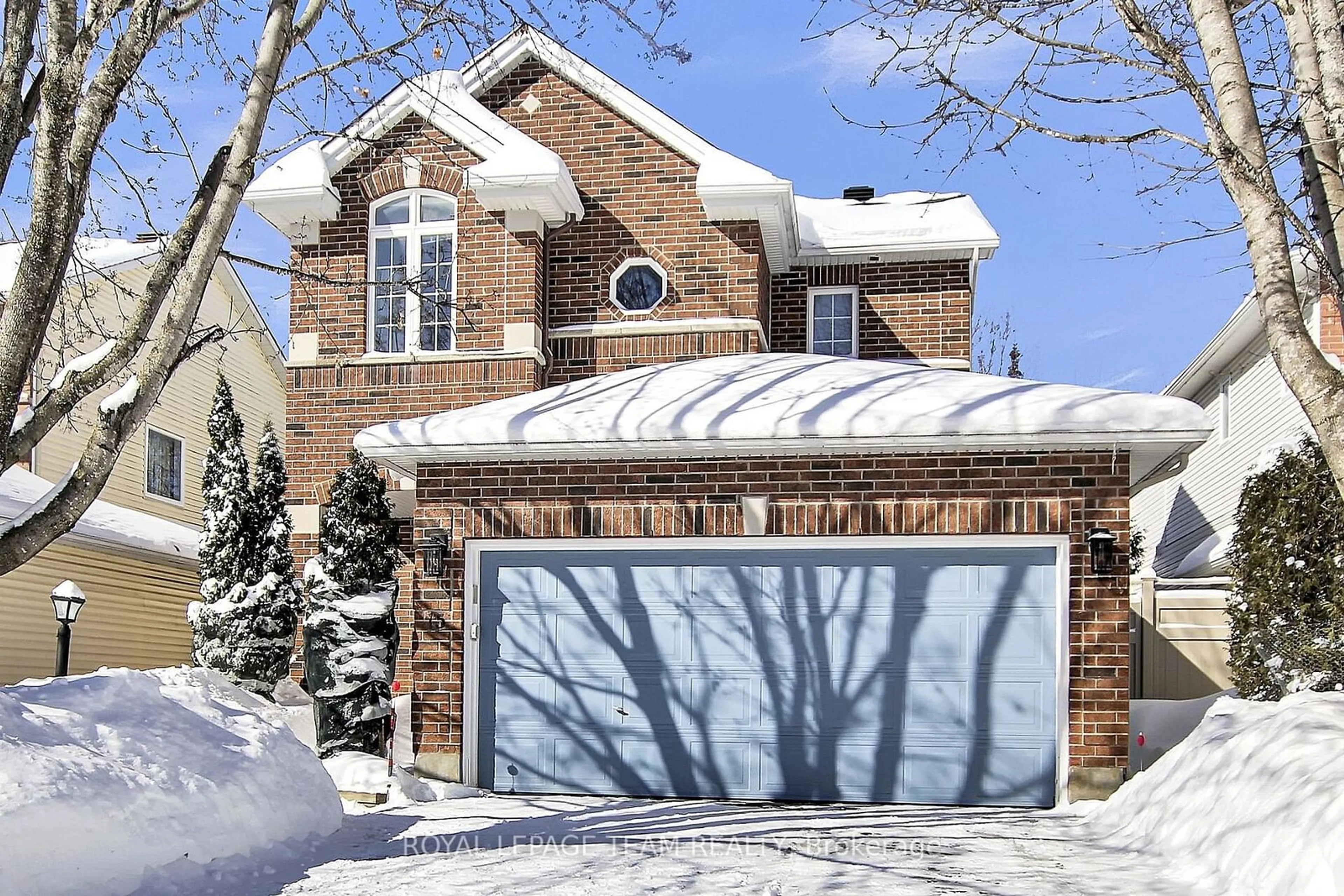 Home with brick exterior material, street for 15 Tamarack Pl, Barrhaven Ontario K2J 4R4