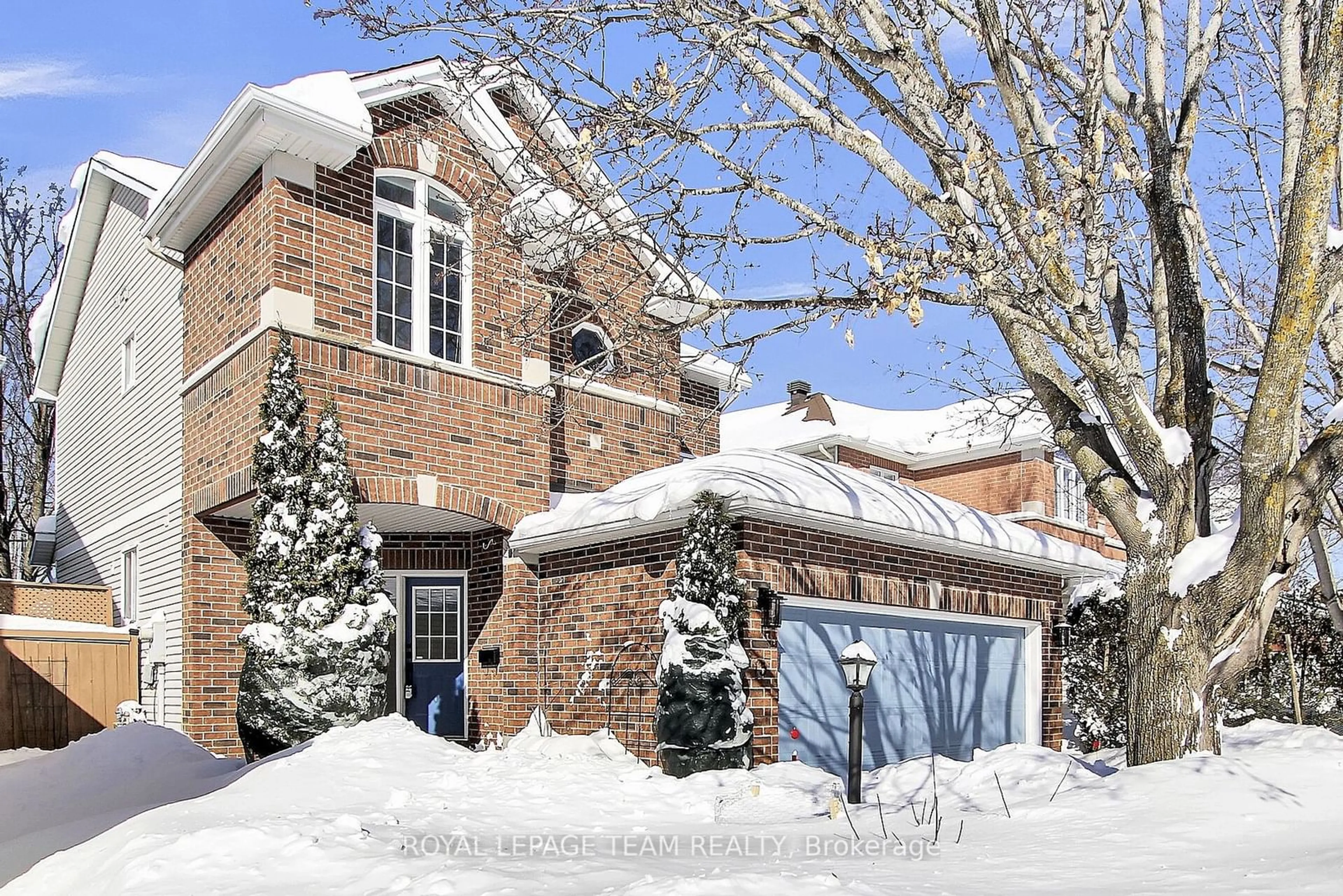 Home with brick exterior material, street for 15 Tamarack Pl, Barrhaven Ontario K2J 4R4