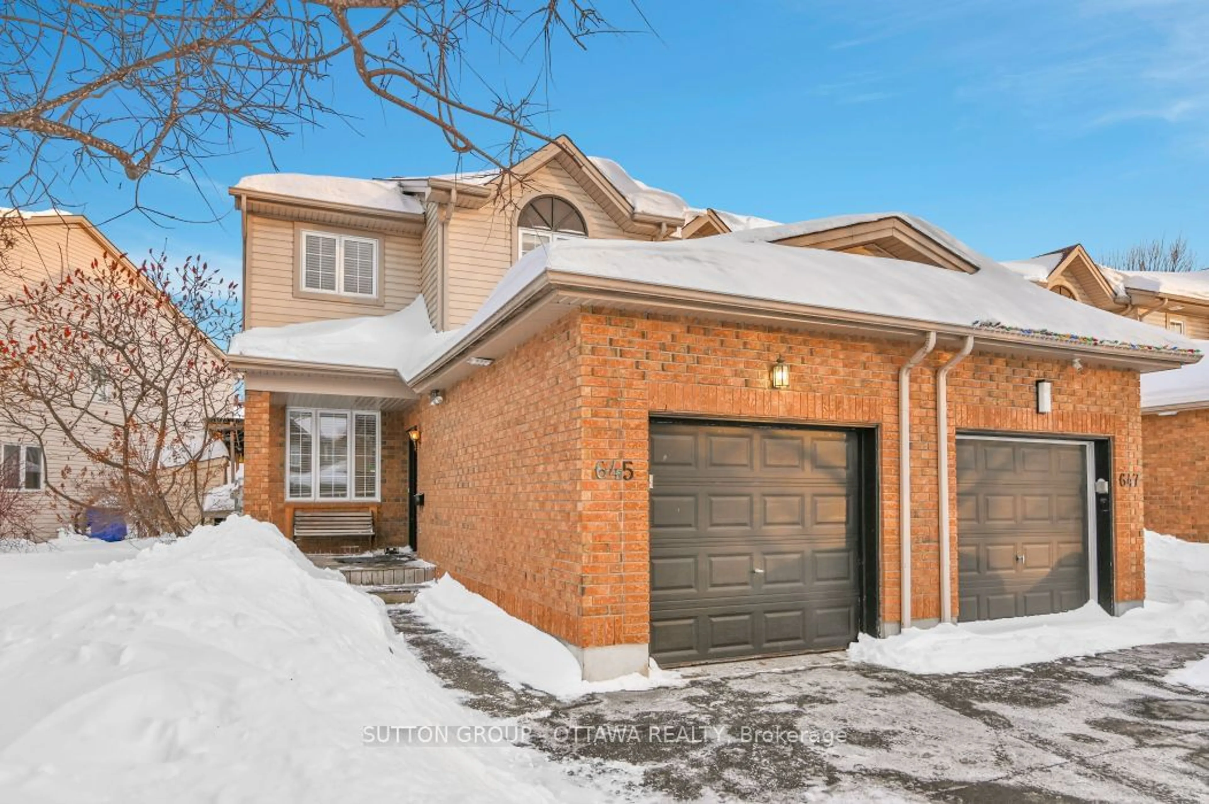 Home with brick exterior material, street for 645 Aberfoyle Circ, Kanata Ontario K2K 3R2