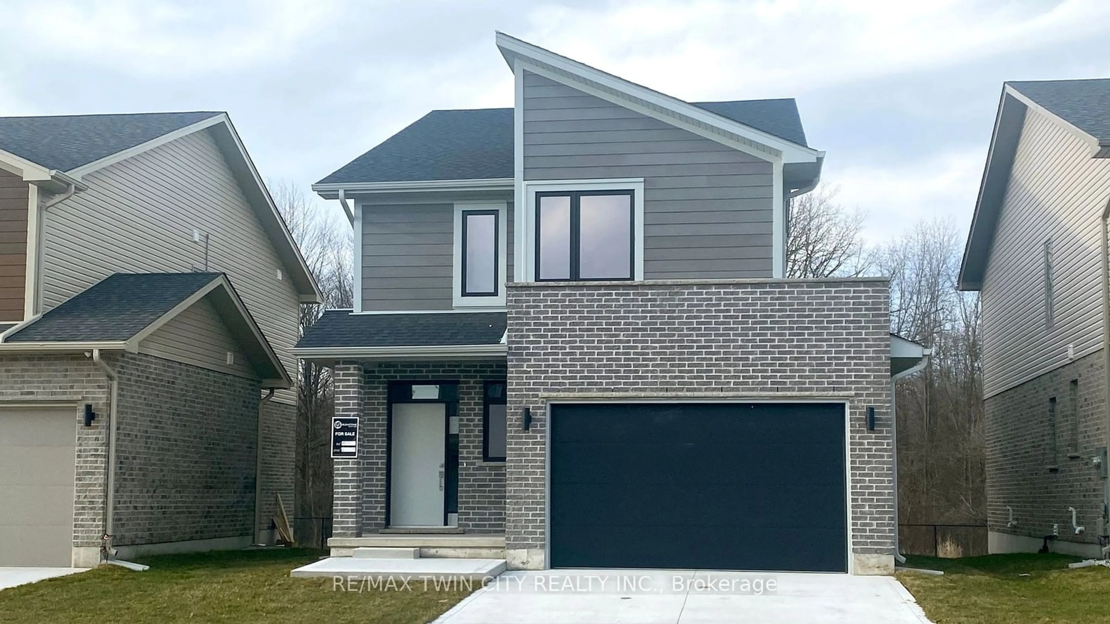 Home with brick exterior material, street for 2024 Evans Blvd, London Ontario N6M 0J6