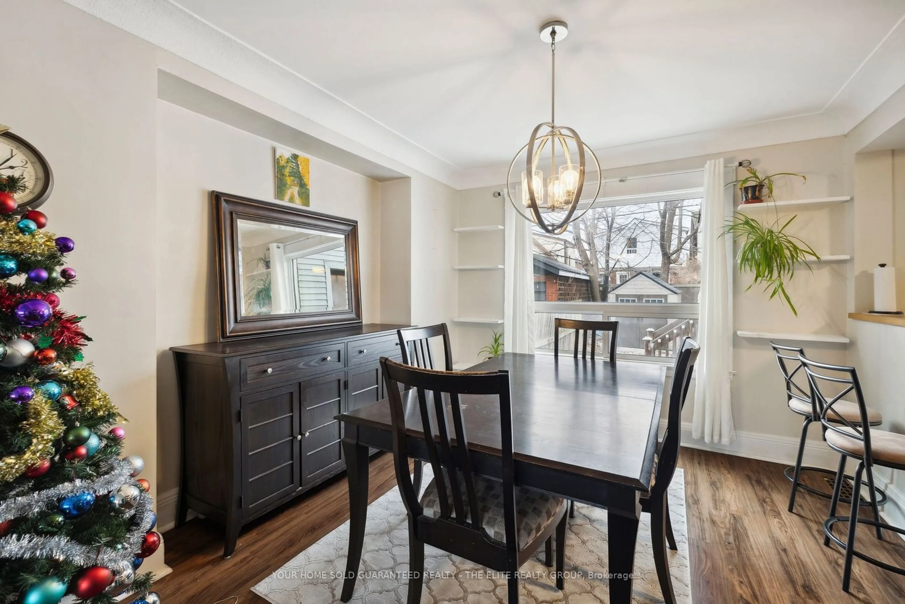 Dining room, wood/laminate floor for 167 Balsam Ave, Hamilton Ontario L8L 6Y4