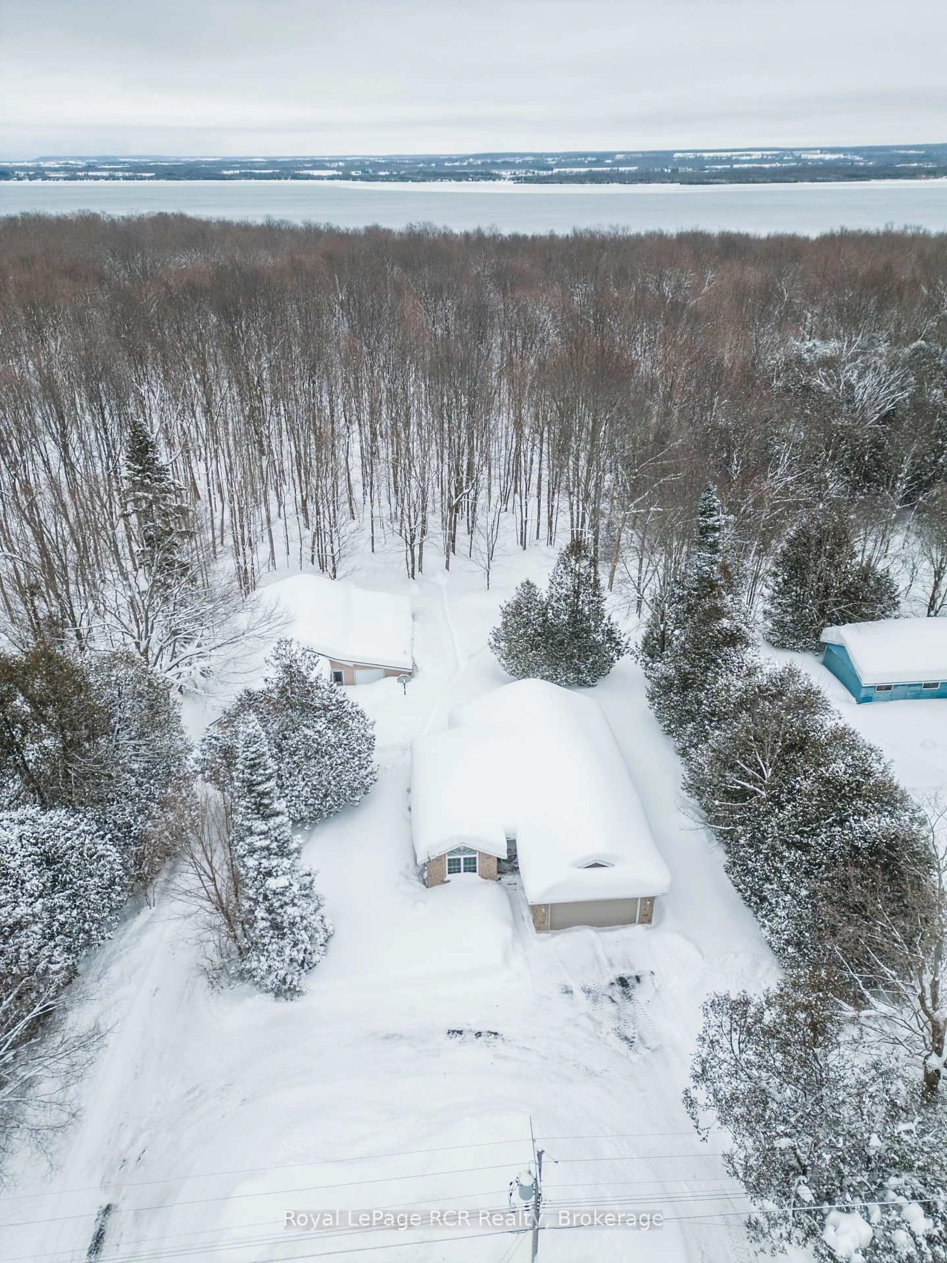 A pic from outside/outdoor area/front of a property/back of a property/a pic from drone, unknown for 318783 1 Grey Rd, Georgian Bluffs Ontario N4K 5N4