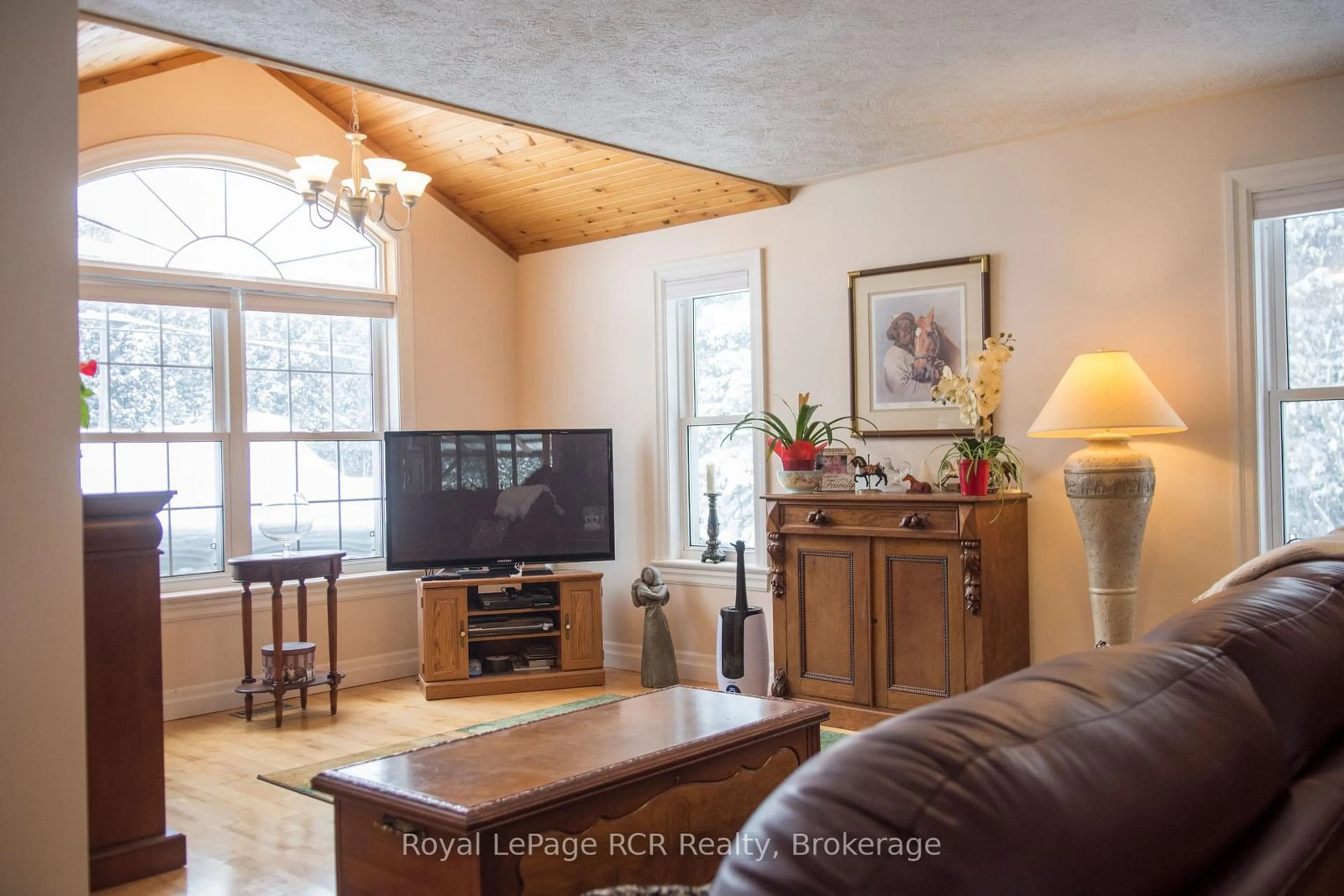 Living room with furniture, wood/laminate floor for 318783 1 Grey Rd, Georgian Bluffs Ontario N4K 5N4