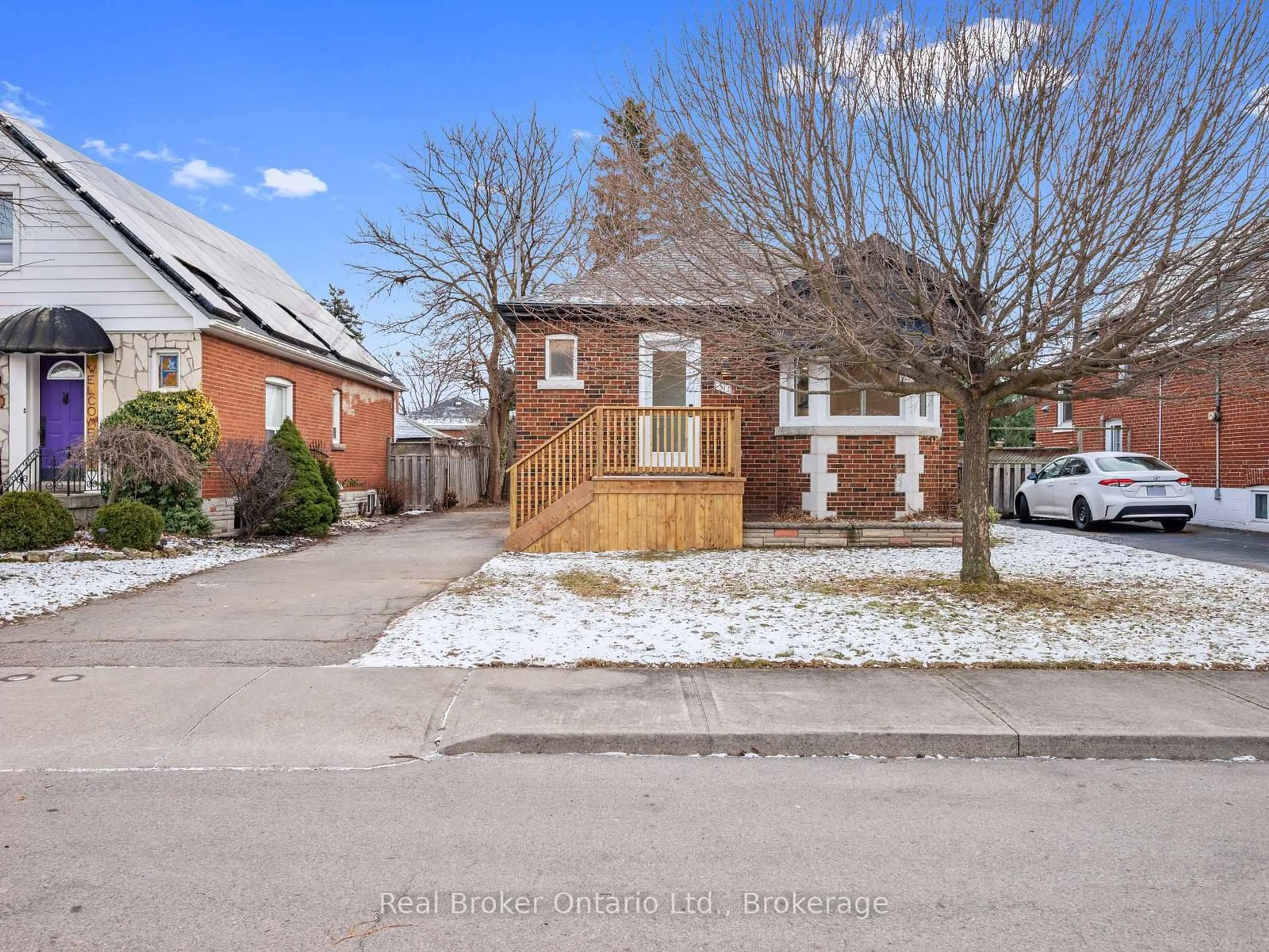 Home with brick exterior material, street for 51 Woodbridge Rd, Hamilton Ontario L8K 3C8