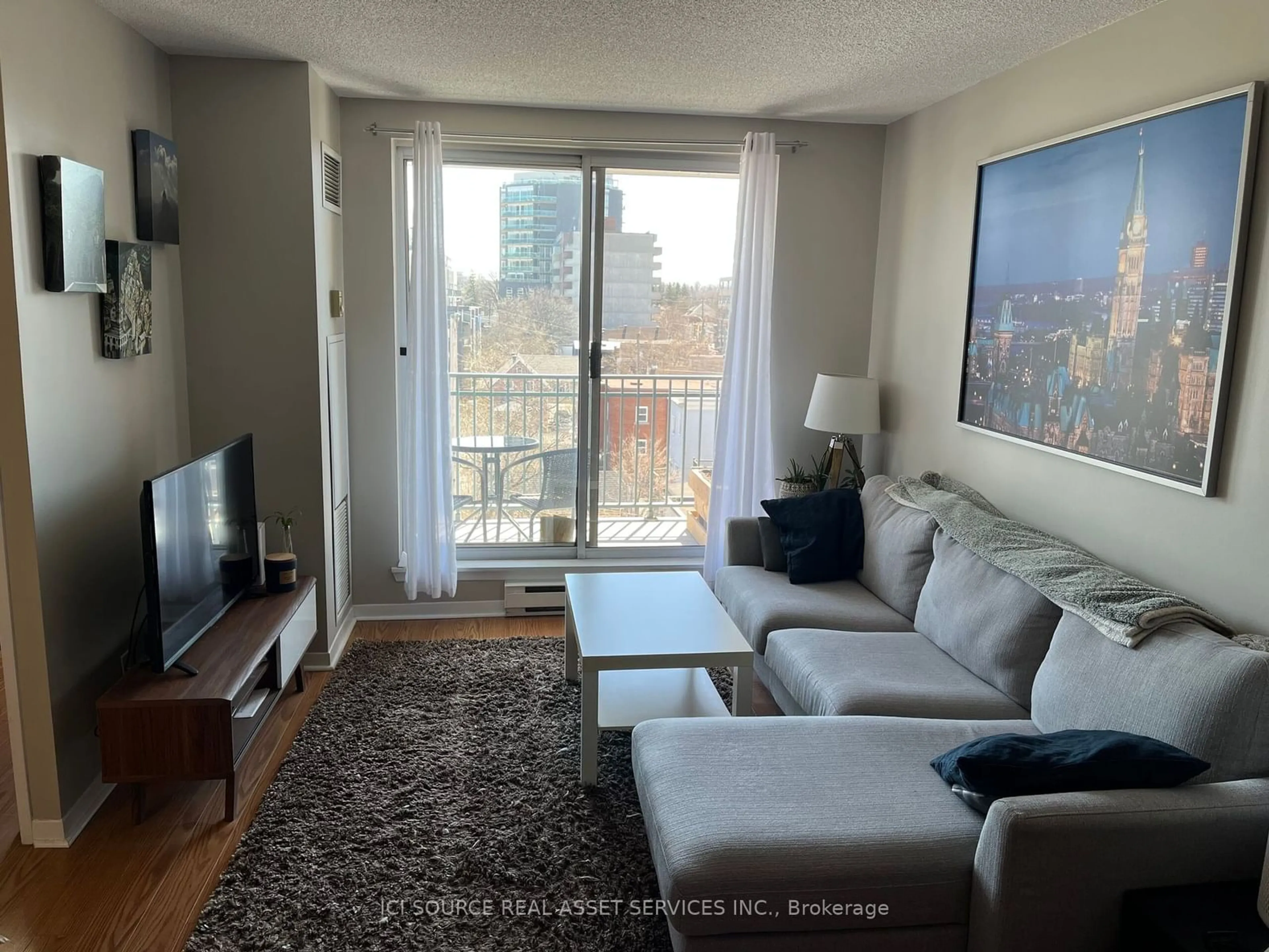 Living room with furniture, unknown for 45 Holland Ave #610, Tunneys Pasture and Ottawa West Ontario K1Y 4S3