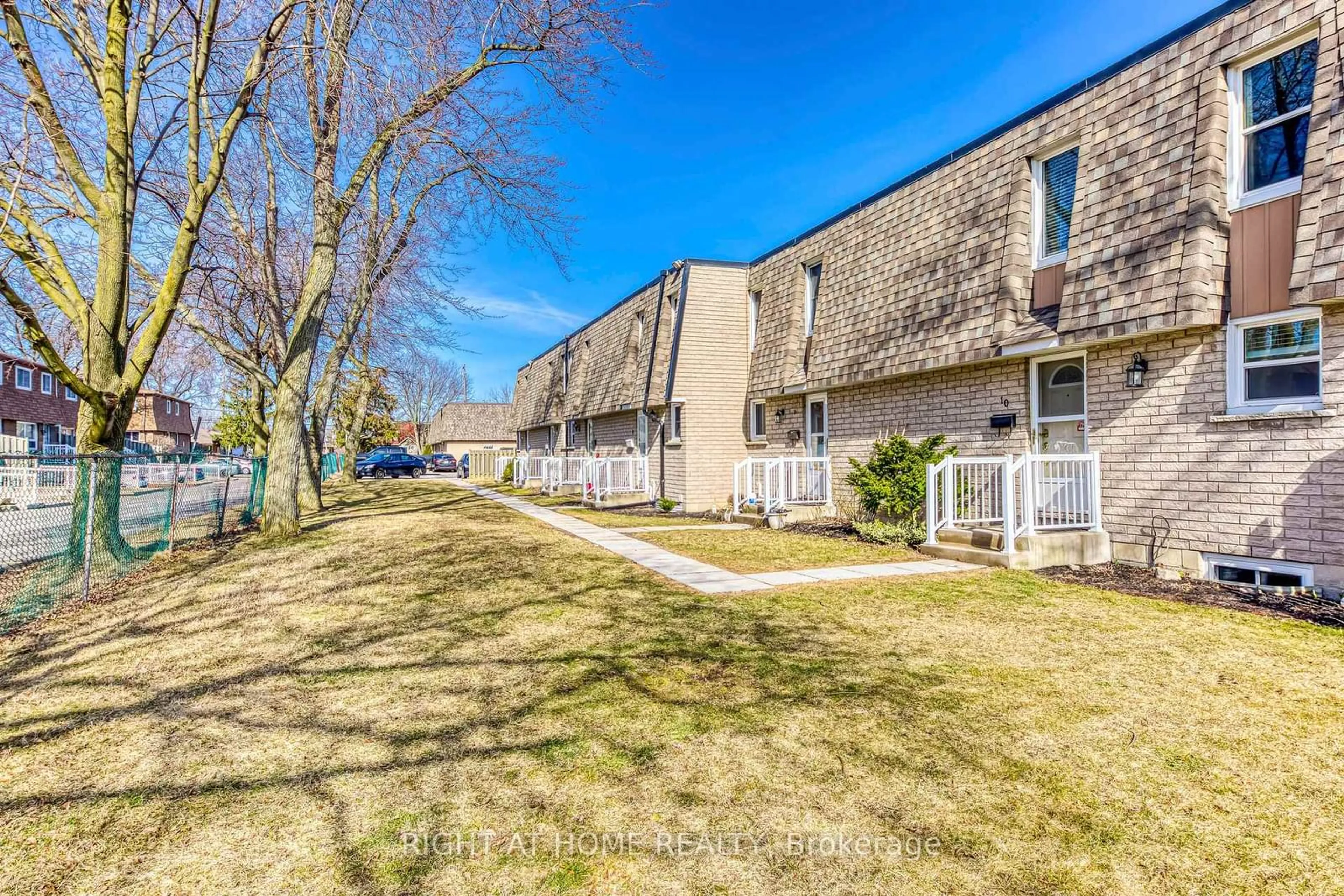 A pic from outside/outdoor area/front of a property/back of a property/a pic from drone, street for 153 Limeridge Rd #10, Hamilton Ontario L9C 2V3