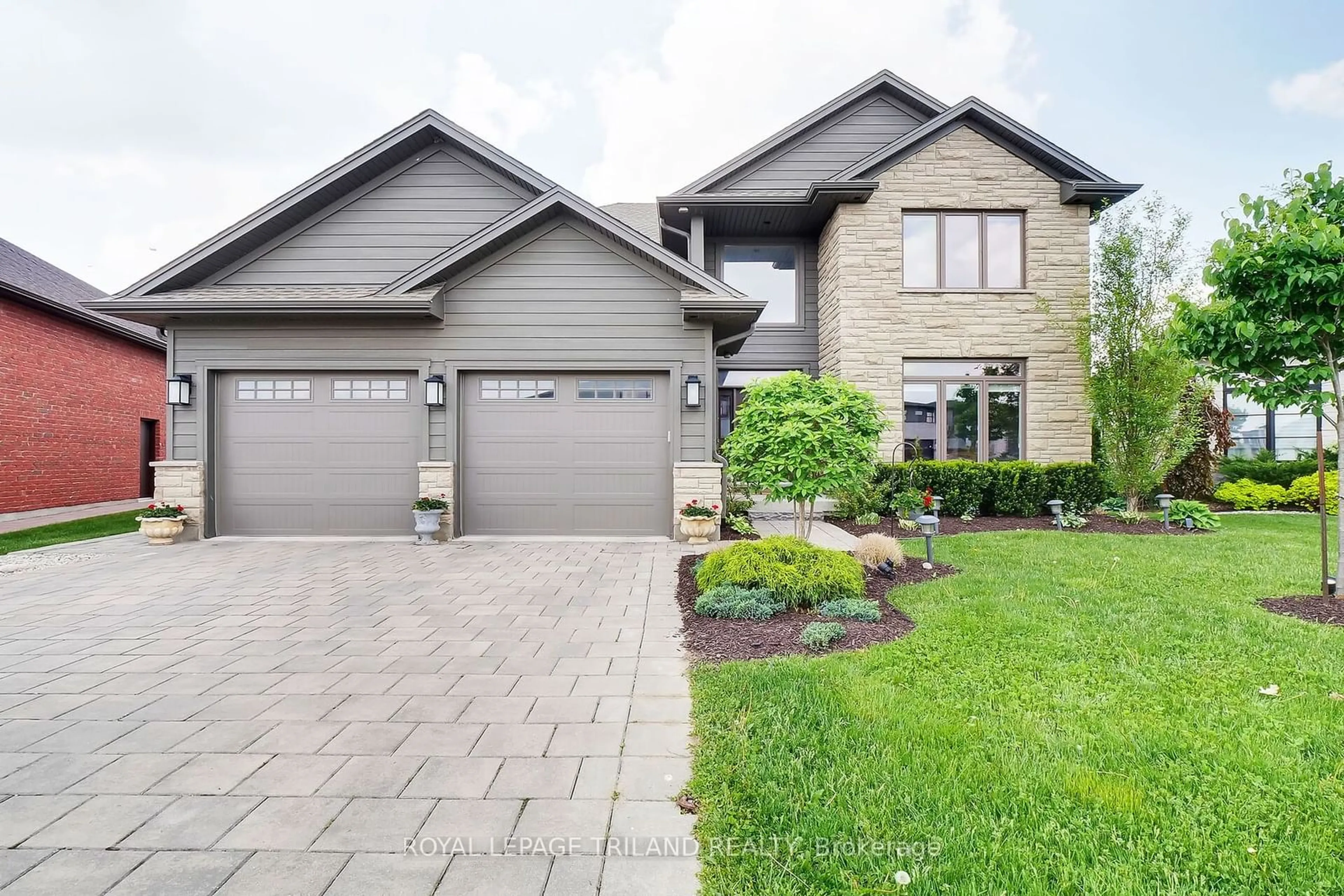 Home with brick exterior material, street for 2430 Brayford Cres, London Ontario N6K 0H7