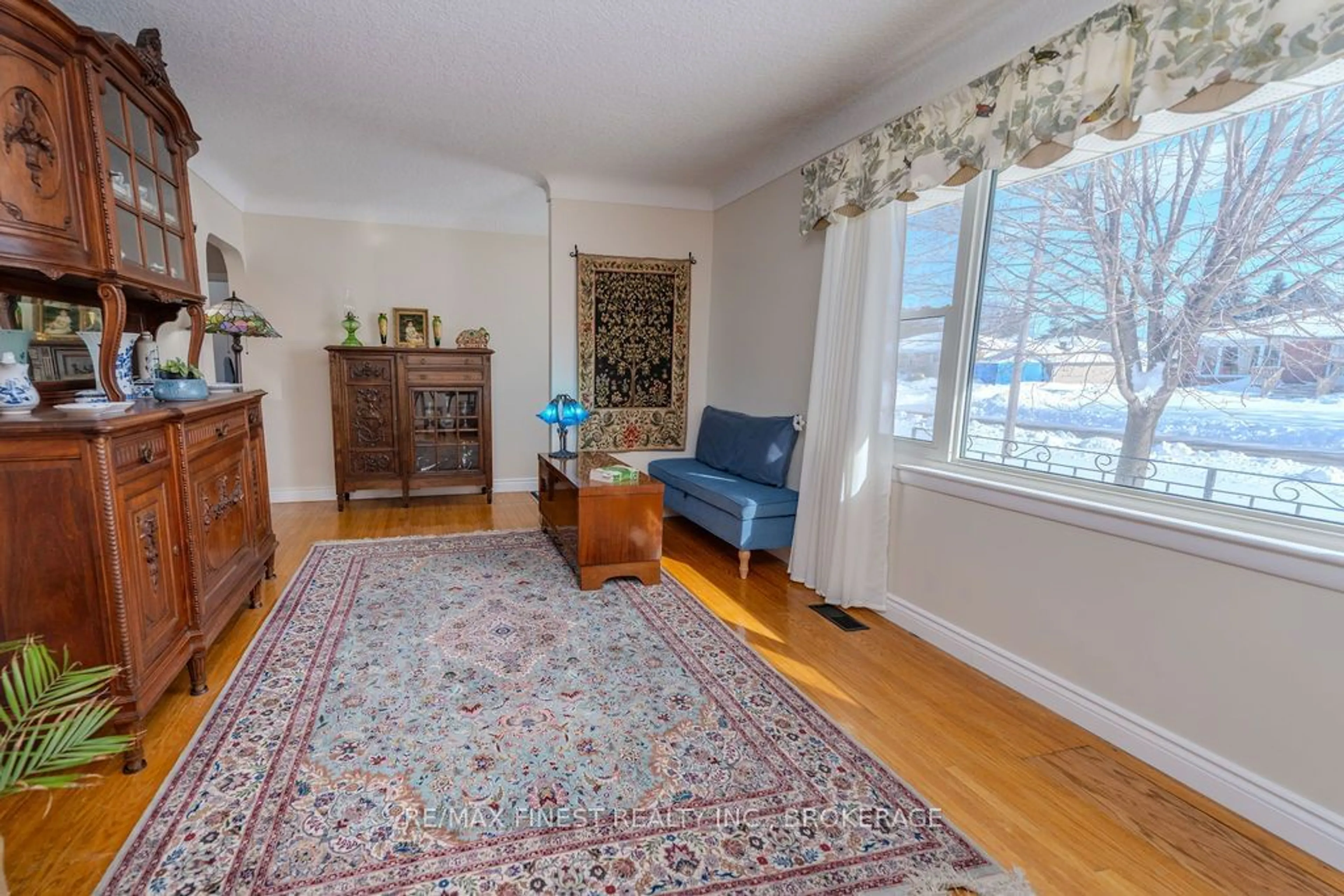 Living room with furniture, carpet floor for 479 Kirkwood Rd, Kingston Ontario K7M 3X3