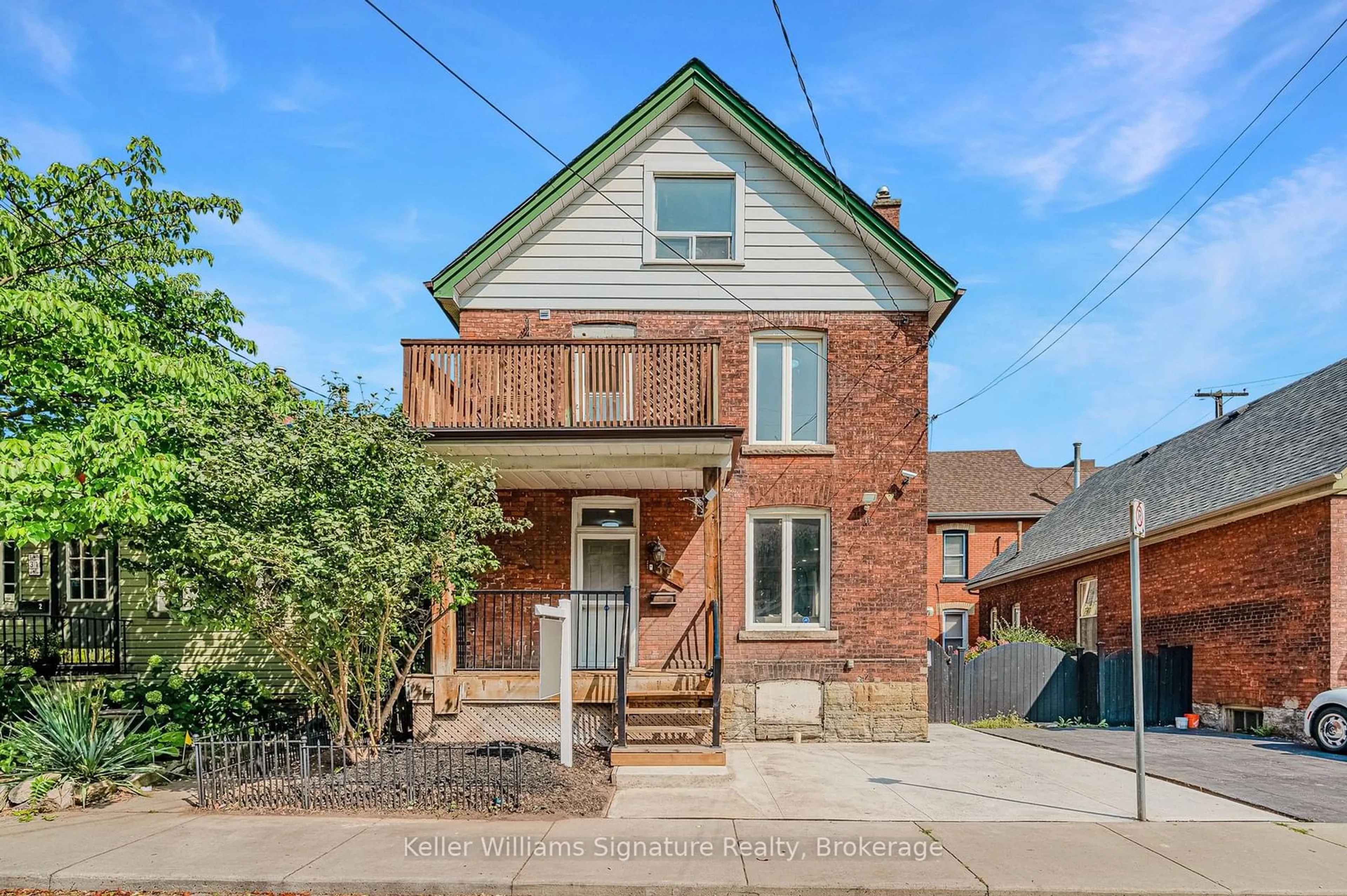 Home with brick exterior material, street for 39 Alanson St, Hamilton Ontario L8N 1W6