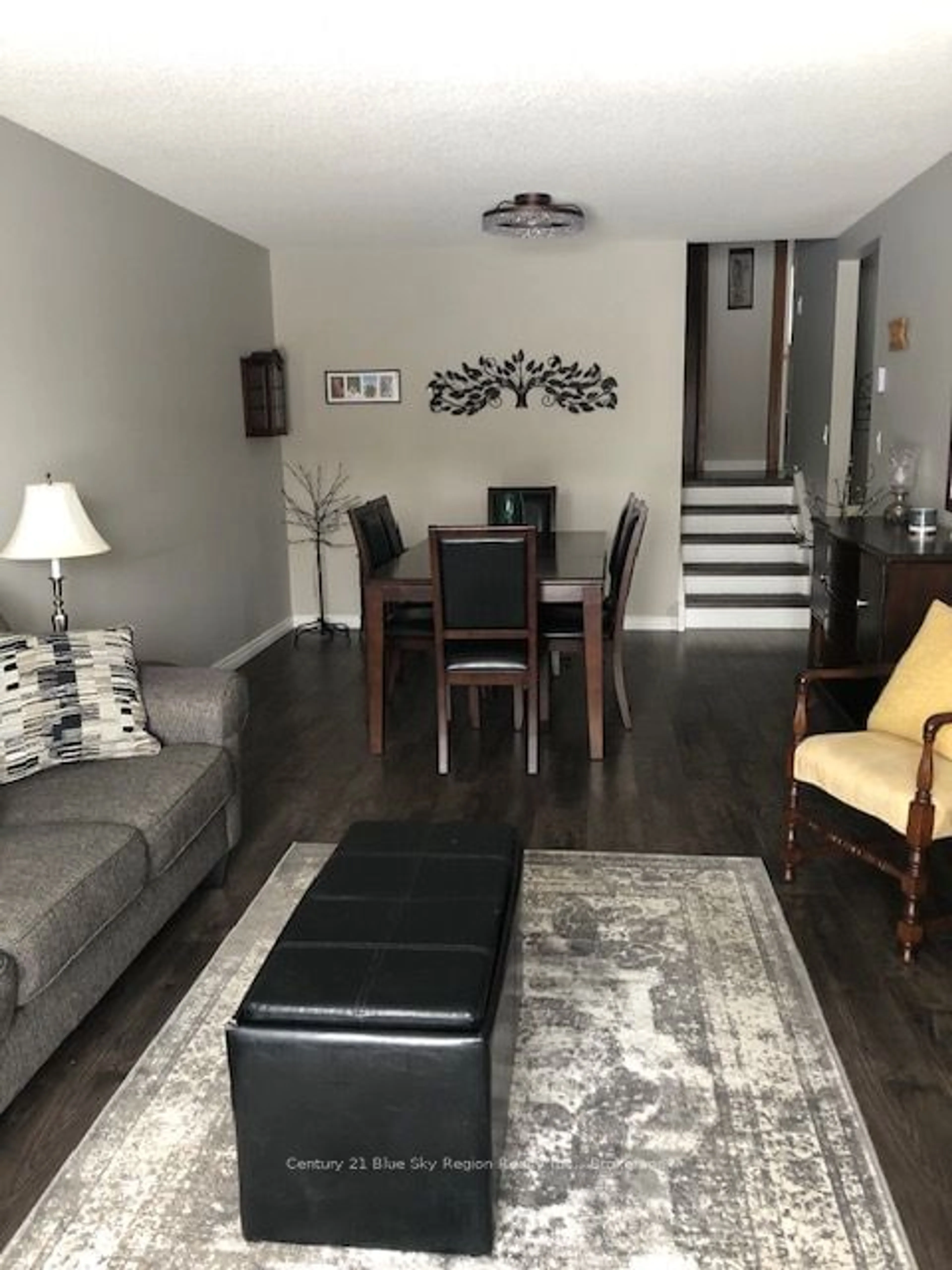 Living room with furniture, wood/laminate floor for 1474 Harrison St, North Bay Ontario P1B 6H3