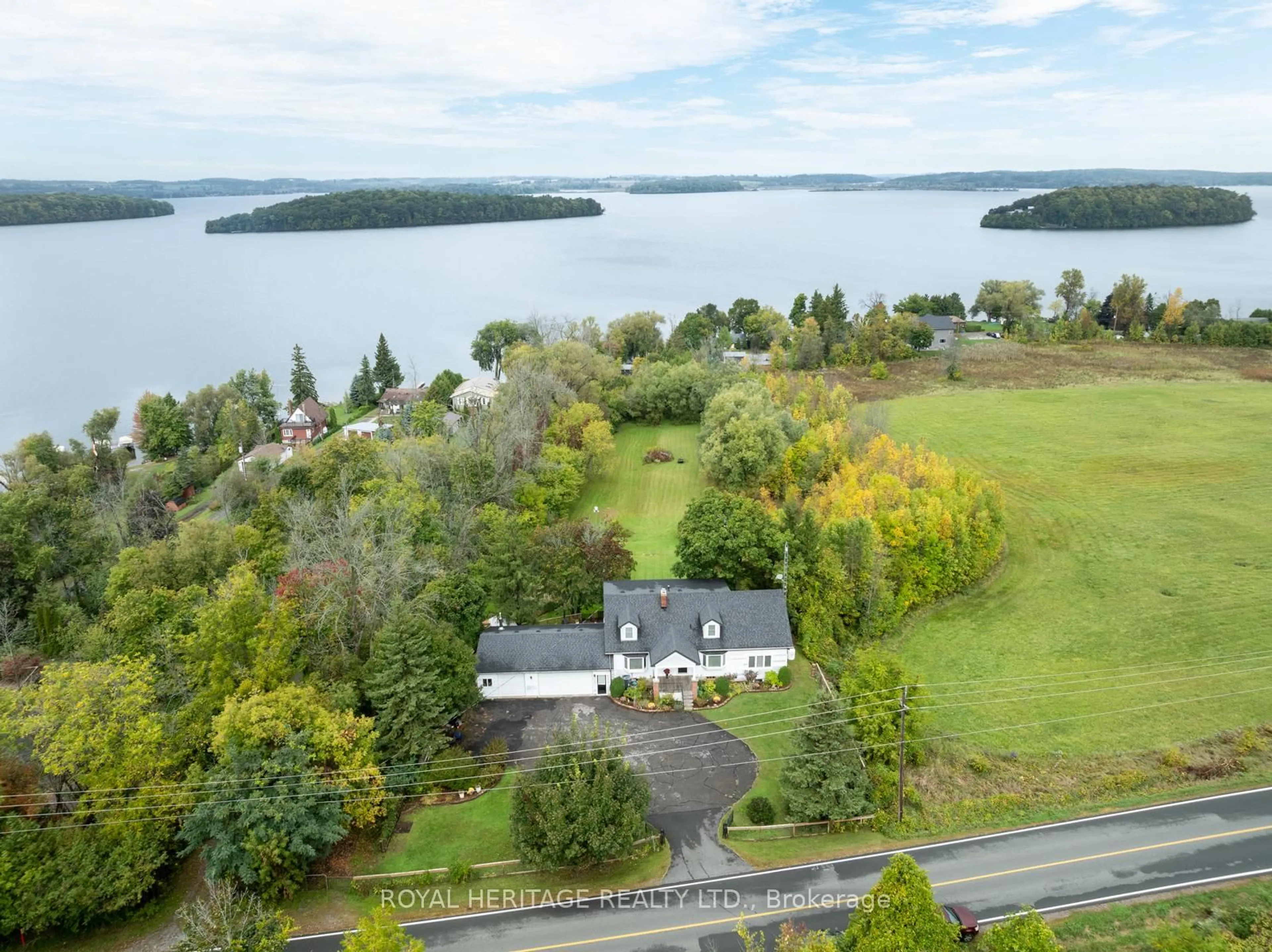 A pic from outside/outdoor area/front of a property/back of a property/a pic from drone, water/lake/river/ocean view for 5348 Rice Lake Scenic Dr, Hamilton Township Ontario K0K 2E0