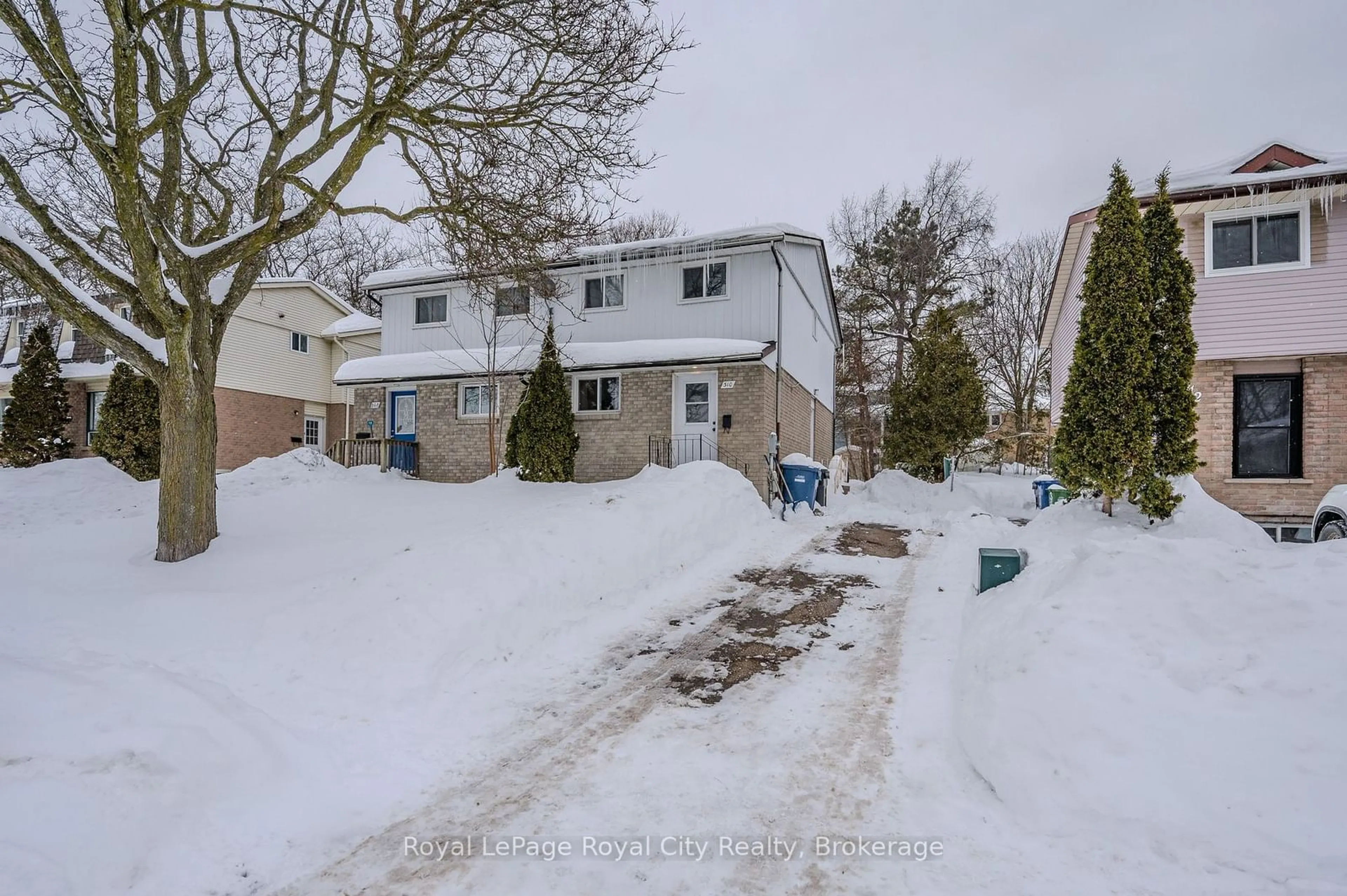 A pic from outside/outdoor area/front of a property/back of a property/a pic from drone, street for 310 Cole Rd, Guelph Ontario N1G 3J2