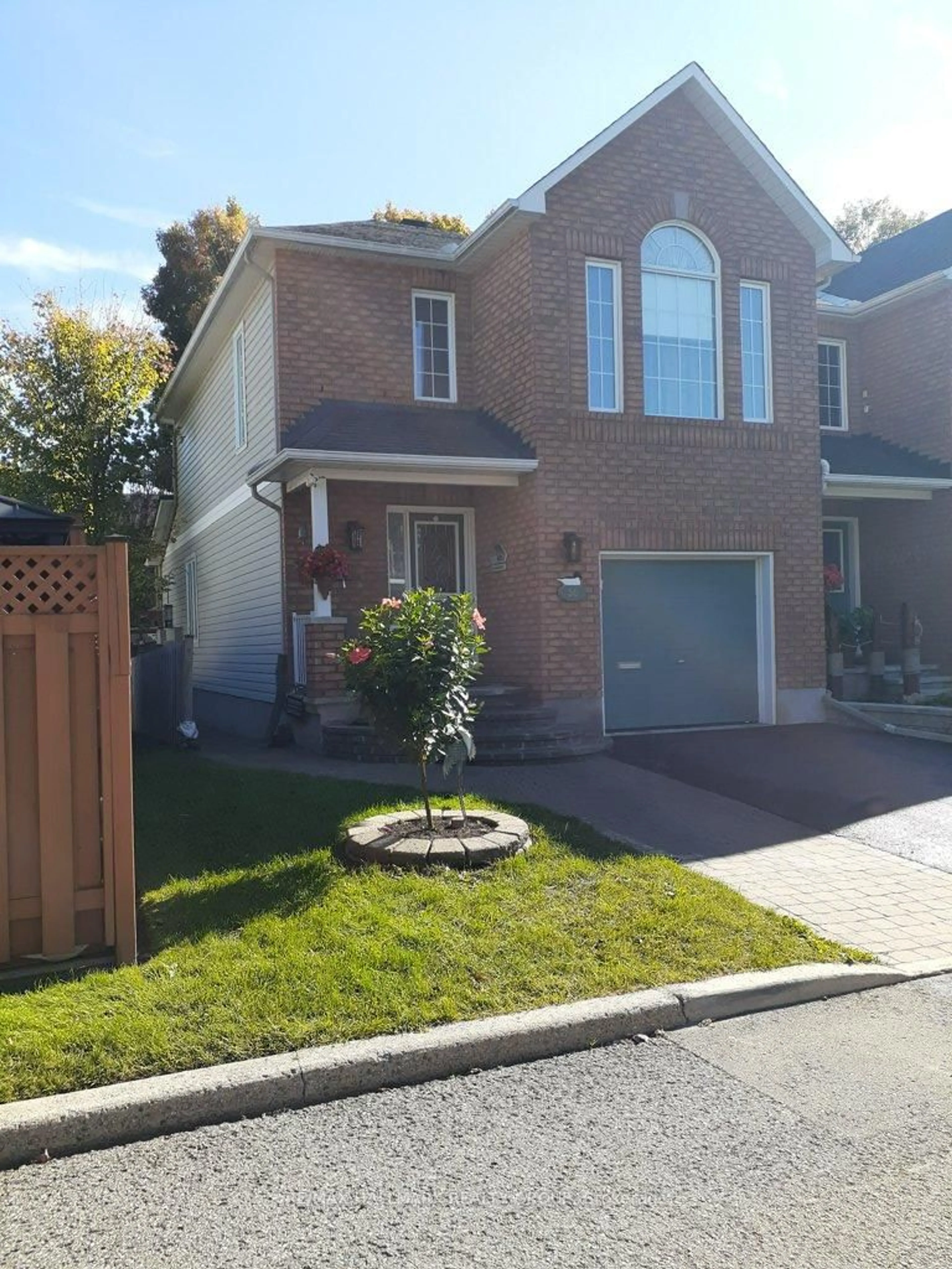 Home with brick exterior material, street for 56 Roseanne Lane, Ottawa Ontario K1B 1C2