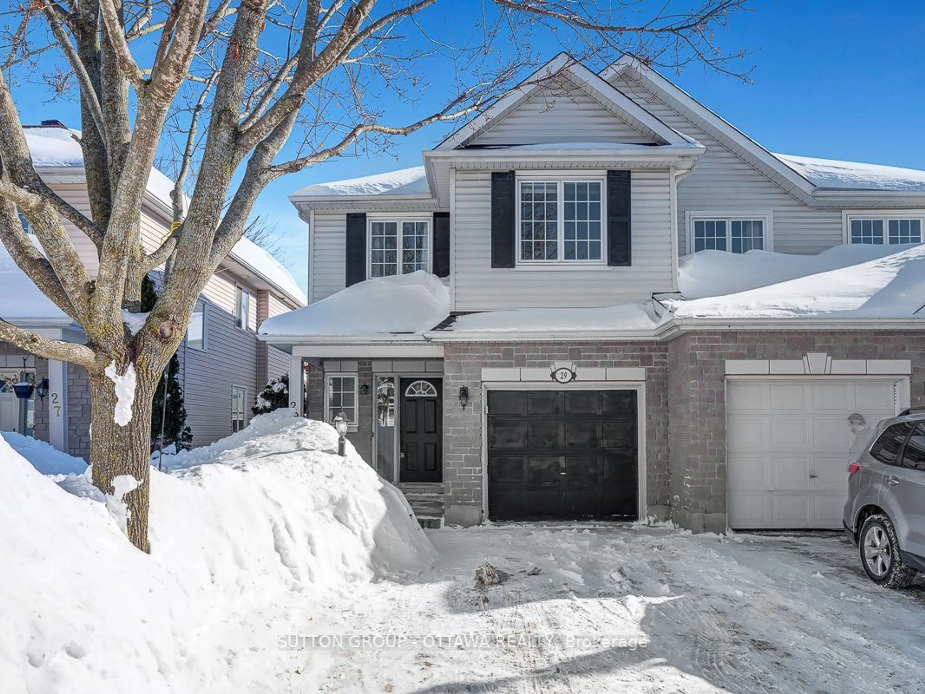 Home with brick exterior material, street for 29 Alameda Way, Barrhaven Ontario K2J 5B4