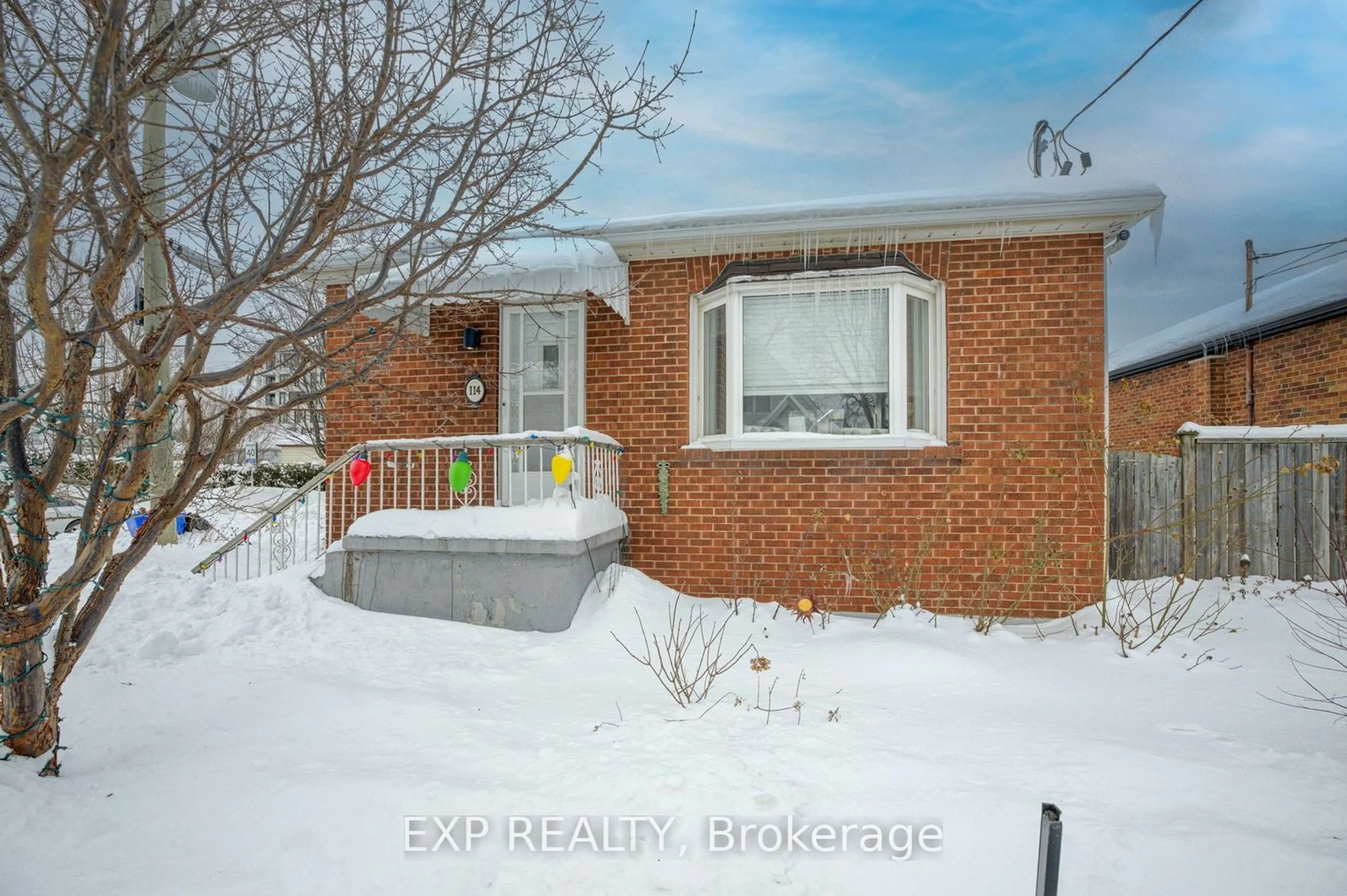 Home with brick exterior material, street for 114 East 11th St, Hamilton Ontario L9A 3T4