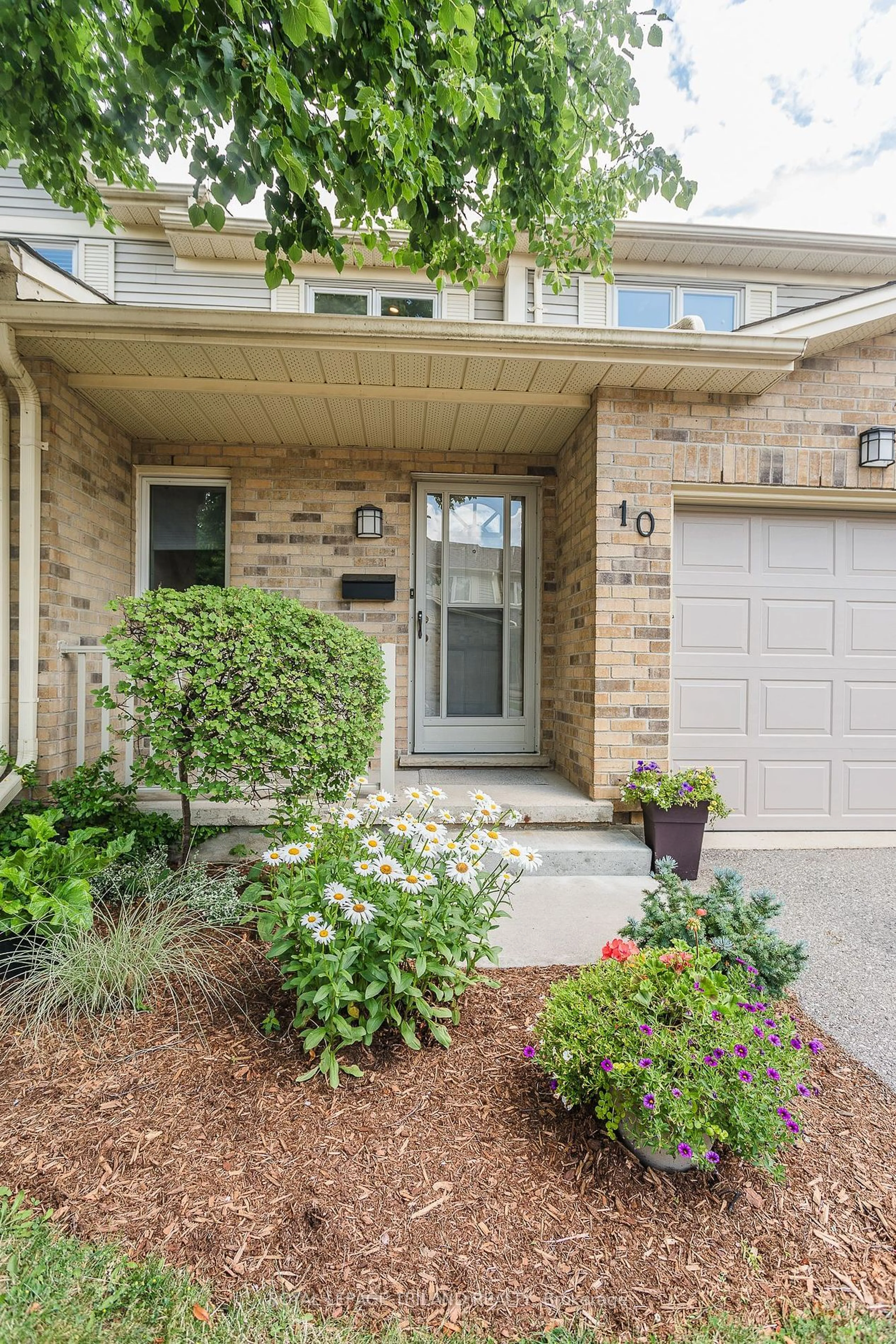 Home with brick exterior material, street for 10 Rossmore Crt #10, London Ontario N6C 6A3