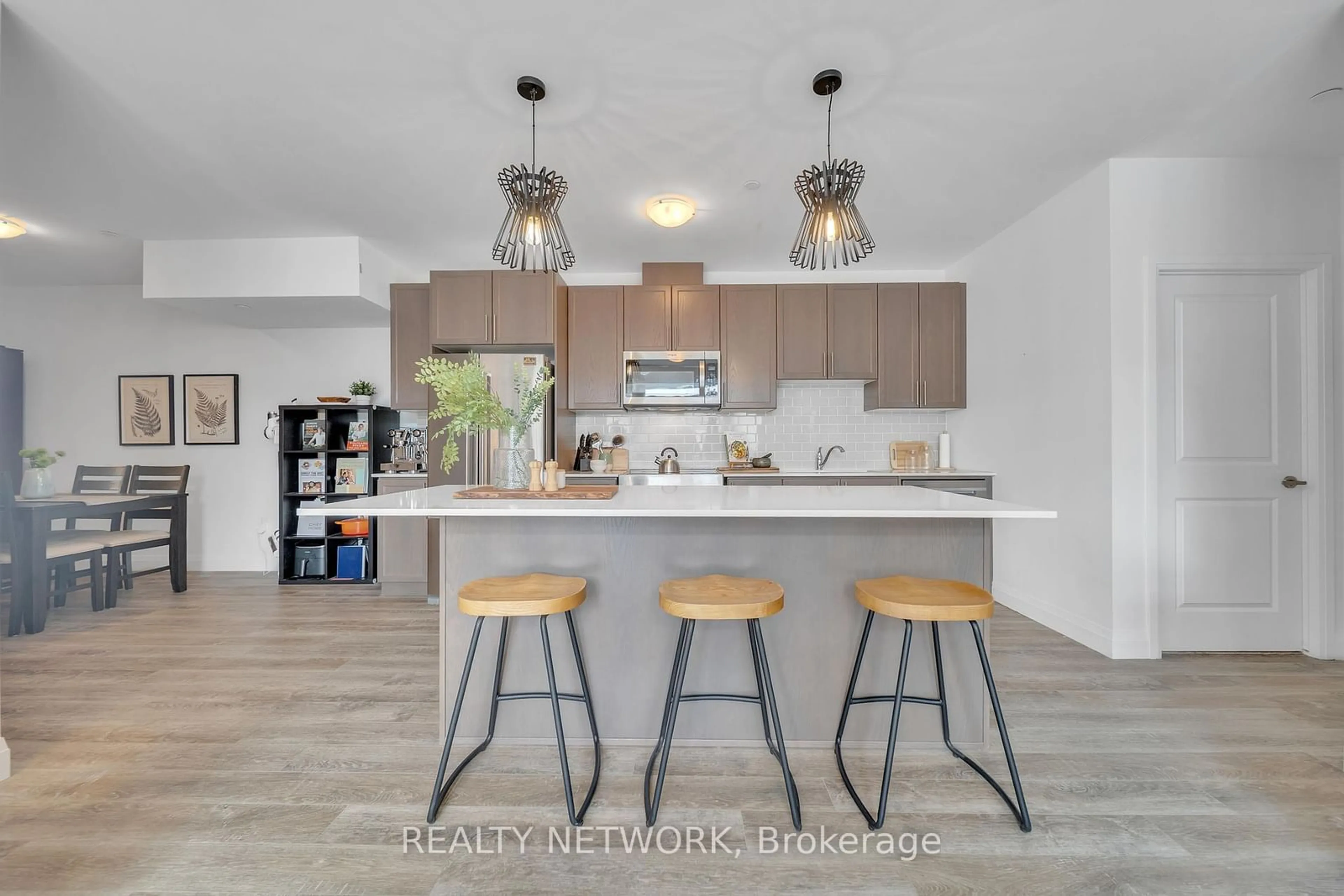 Open concept kitchen, unknown for 1 Redfern Ave #410, Hamilton Ontario L9C 0E6